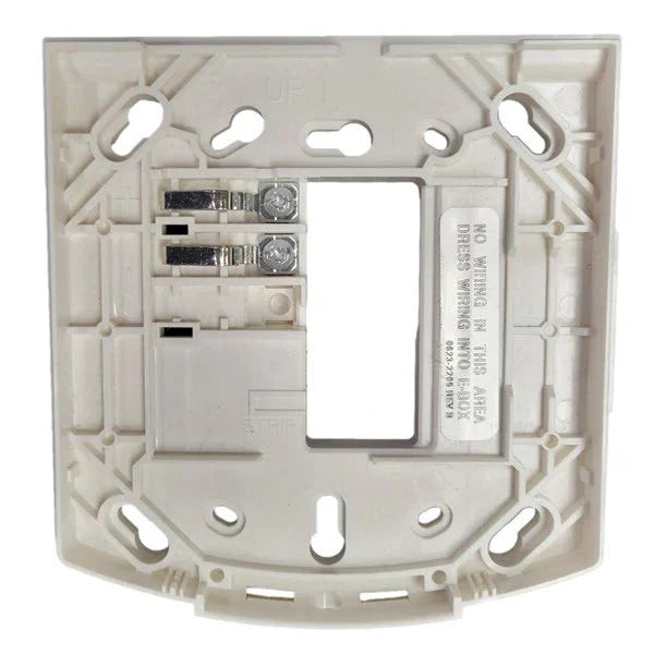 Simplex 49MP-AVVOWW white wall mounting plate with mounting holes for secure installation.