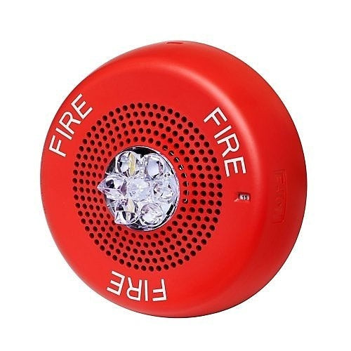 Eaton Wheelock Eluxa horn strobe fire alarm with FIRE lettering, ceiling mount, featuring red horn and clear strobe light.