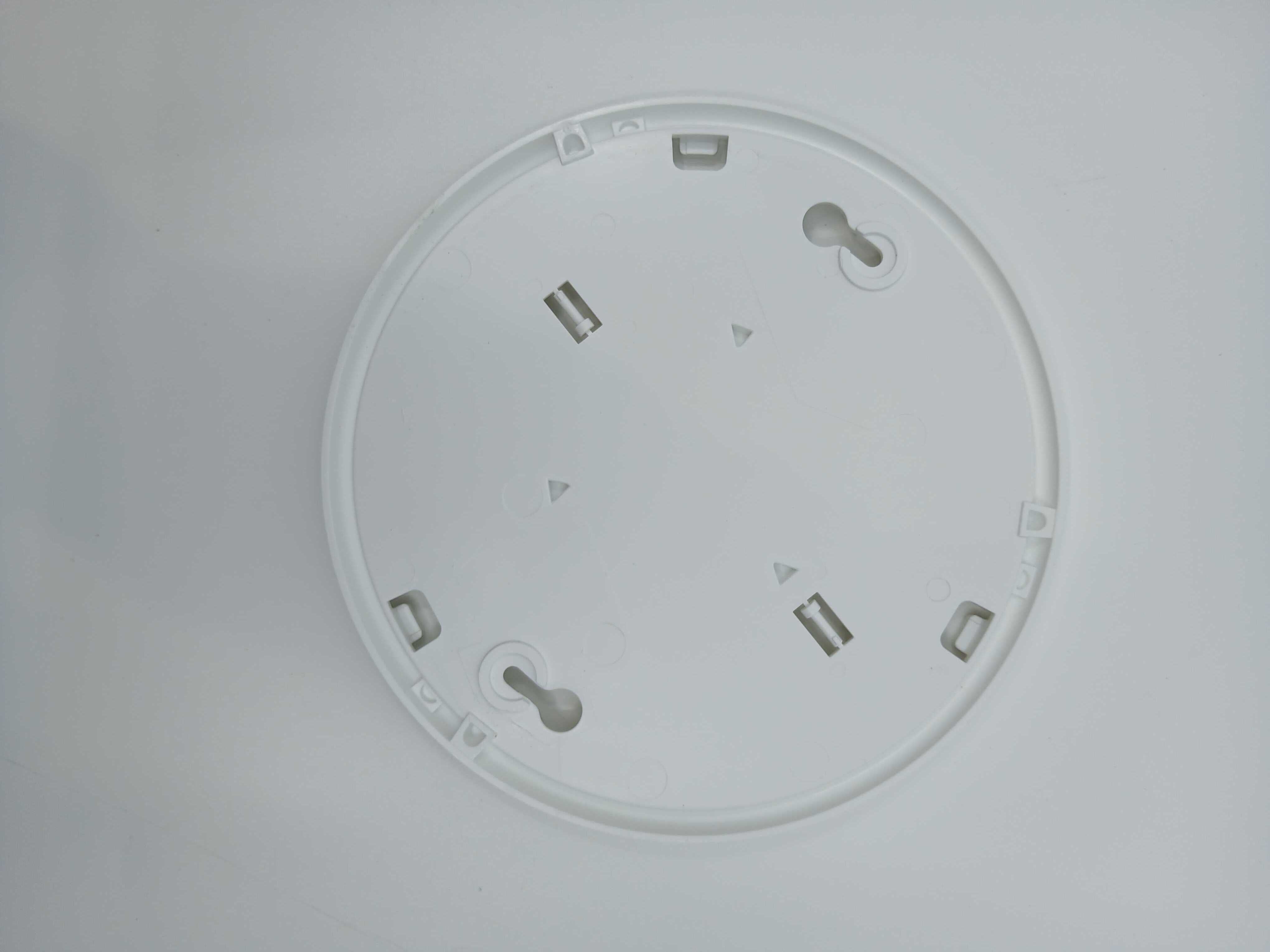 BRK 10-year sealed battery smoke alarm combo, mounted on ceiling, with digital display and test button for safety monitoring.