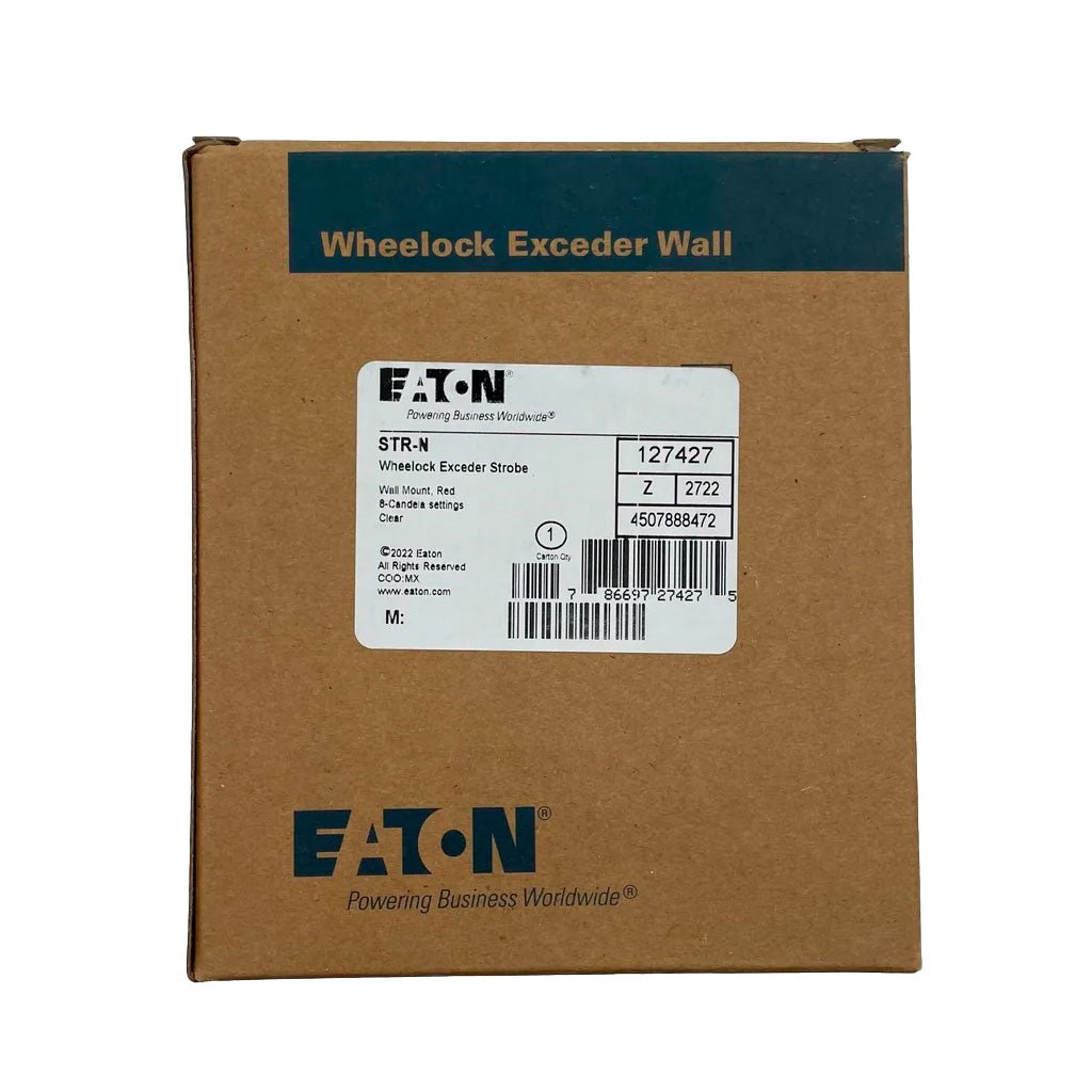 Eaton Wheelock STR-N red strobe light, 12/24V, mounted on a ceiling for emergency warning signals.