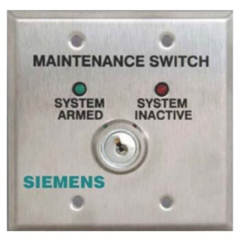 Siemens CPY-MTS maintenance switch for fire alarm systems, shown in a close-up of the device with control buttons and connection ports.