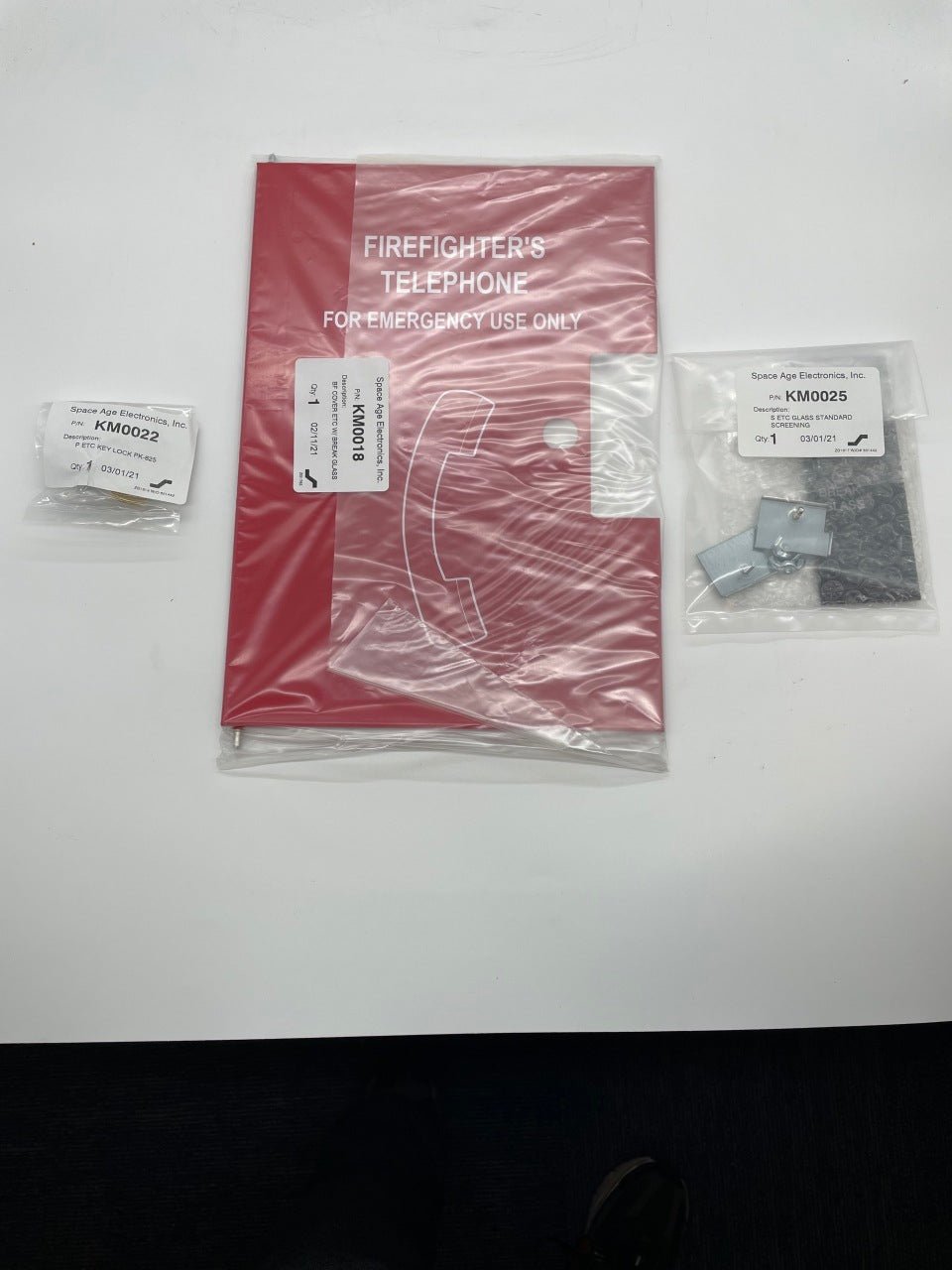 Space Age FC00542 fire alarm with break glass door, mounted on wall for emergency fire alert and safety notification.