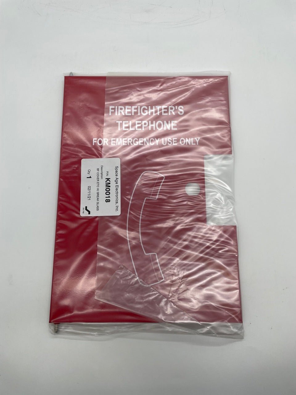 Space Age FC00542 fire alarm with a break glass door, mounted on a wall, ready for emergency use.