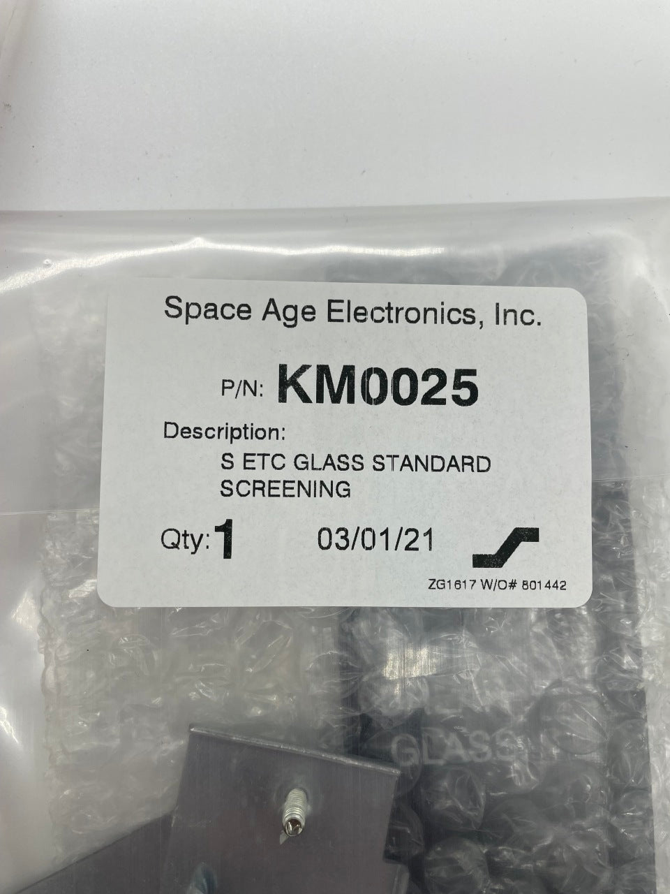 Space Age FC00542 fire alarm with break glass door, safety device for emergency fire alerts, mounted on wall.