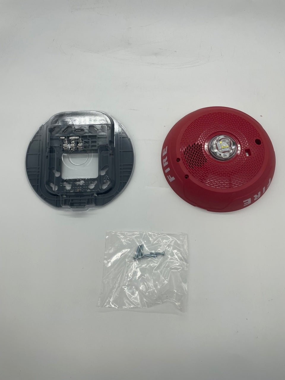 System Sensor CHSCRLED chime strobe in red, a fire alarm device with flashing light and chime for alerting in safety systems.
