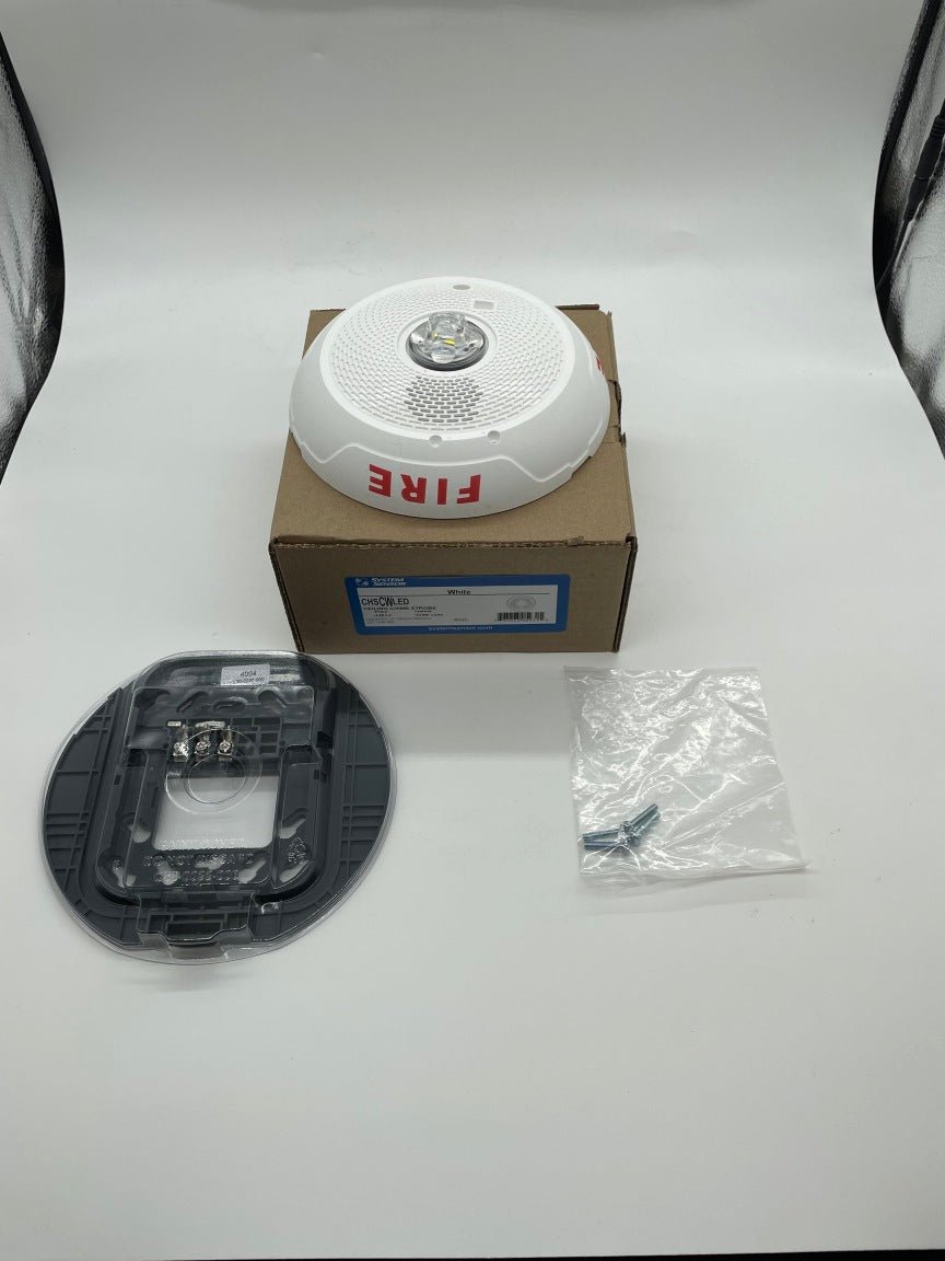 System Sensor CHSCWLED white chime strobe alarm, showing the chime and strobe light in a sleek white finish.