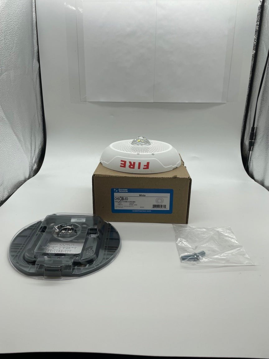White System Sensor CHSCWLED chime strobe light with LED, designed for fire alarm systems, visible in the image.