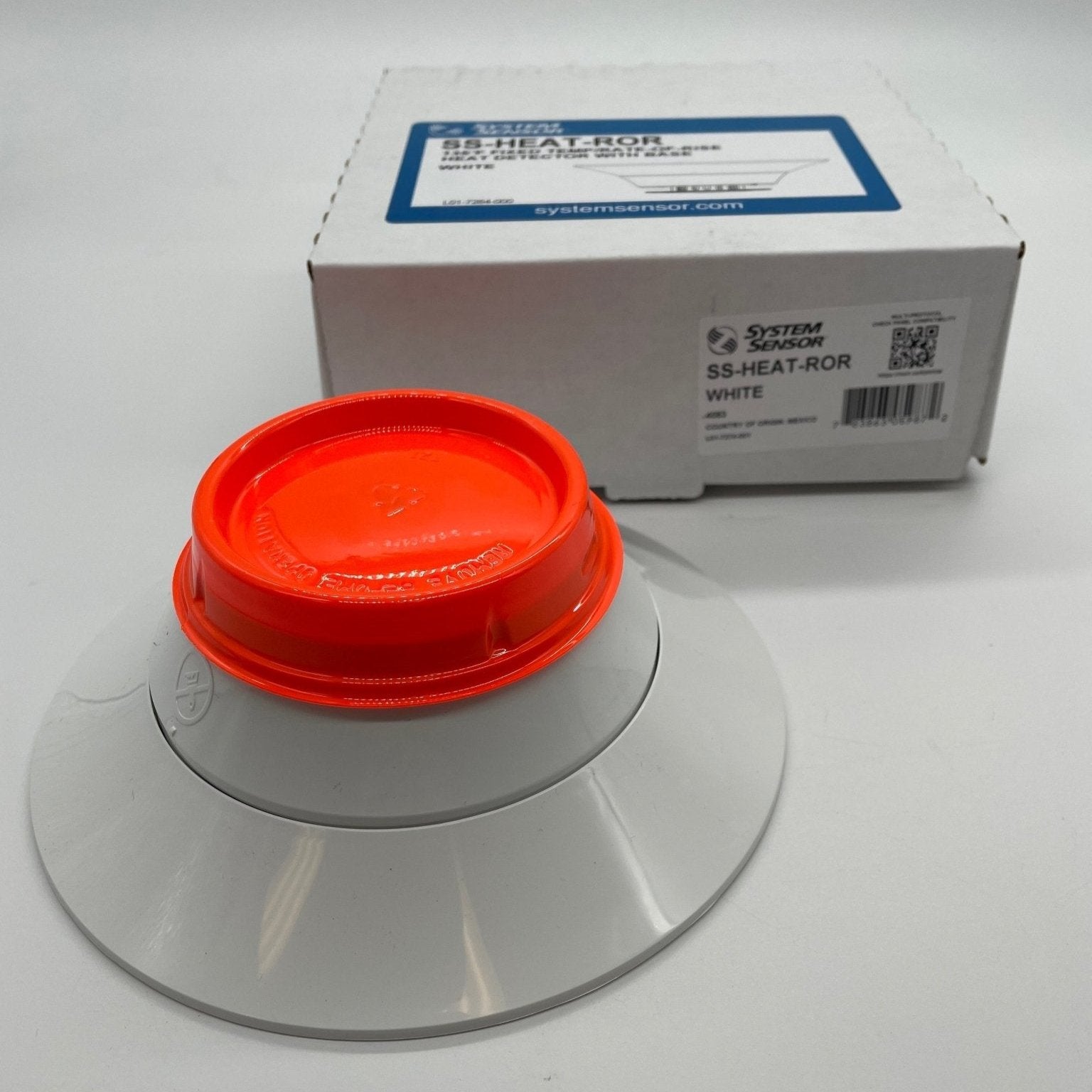 System Sensor SS-HEAT-ROR thermal detector with a compact, white sensor head for heat detection in fire alarm systems.