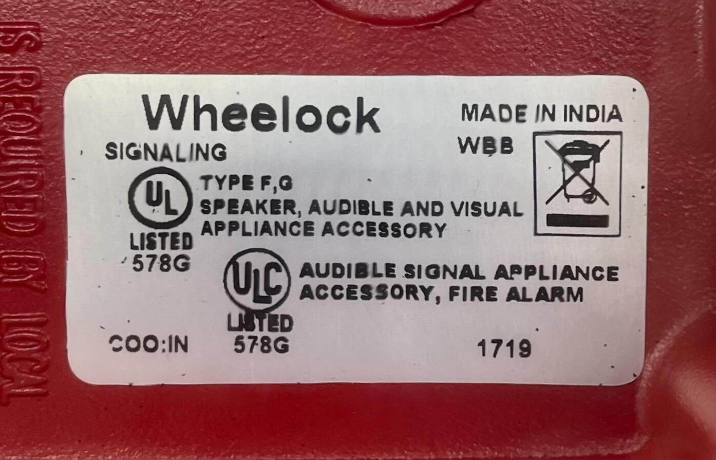 Eaton Wheelock WBB-R-3/4T-3/4B backbox for electrical installations, showing a durable metal enclosure with mounting openings