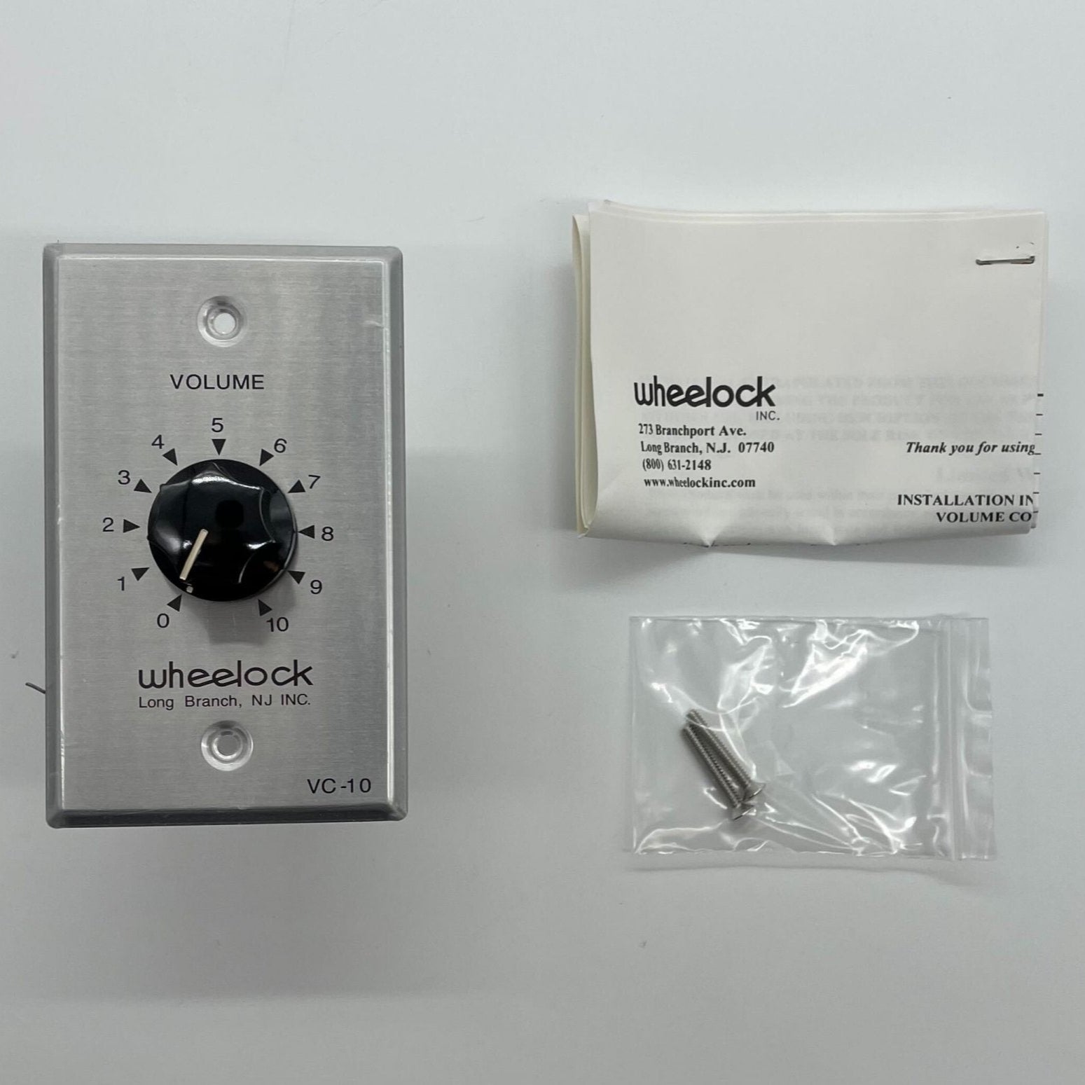 Eaton Wheelock VC-10 volume control knob with black dial and metal mounting, used for audio or PA systems.