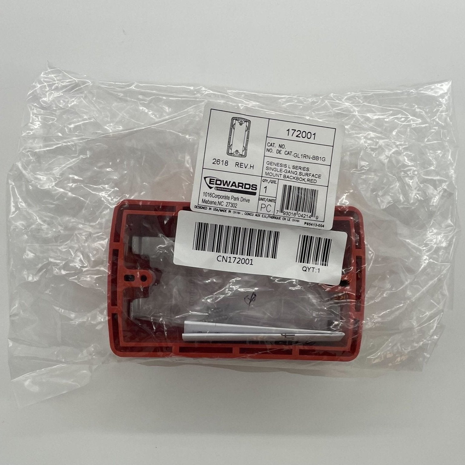 Edwards GL1RN-BB1G surface-mount backbox installed on a wall, used for electrical or communication wiring systems.