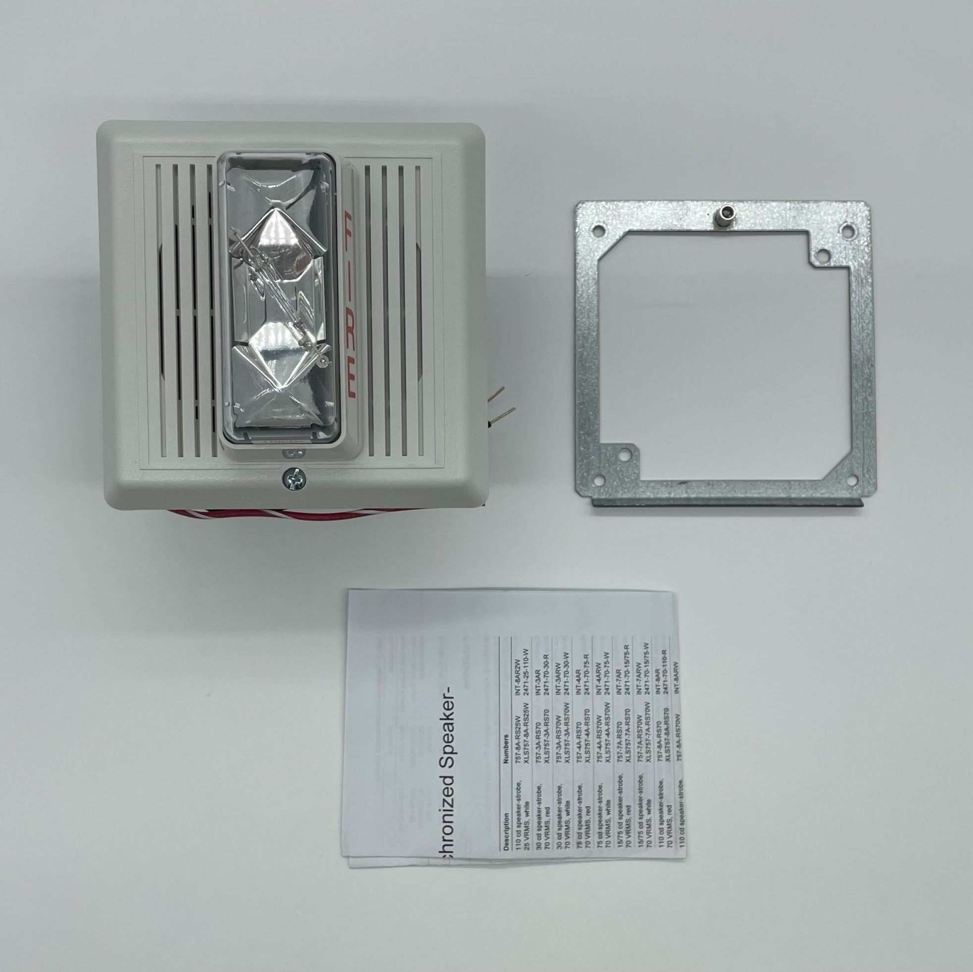 Edwards 757-8A-RS70W white re-entrant speaker strobe with 70V output, mounted on wall, for emergency alert systems.