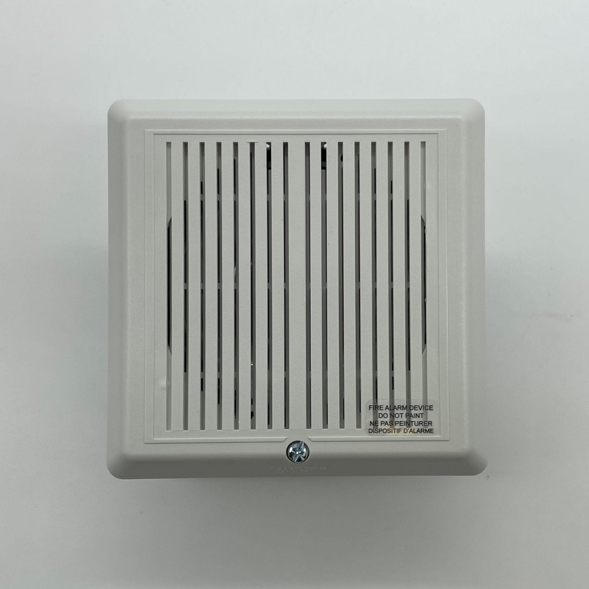 Edwards 757-1A-S70W 70V white cone speaker showing front view with grille and branding, designed for audio installation.