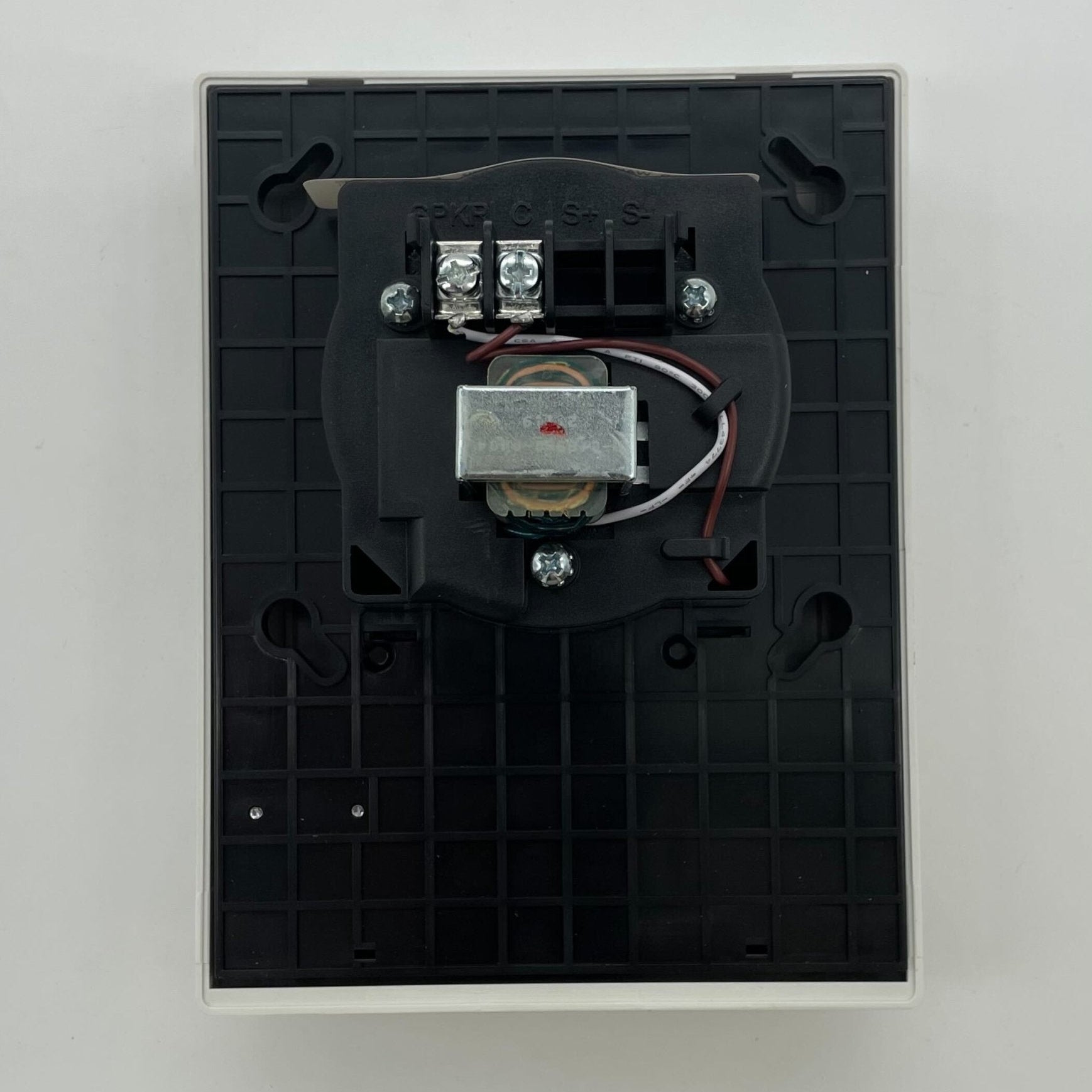 Edwards Genesis G4HFWF-S7 high fidelity wall speaker mounted on a wall with a sleek black design and modern grille.