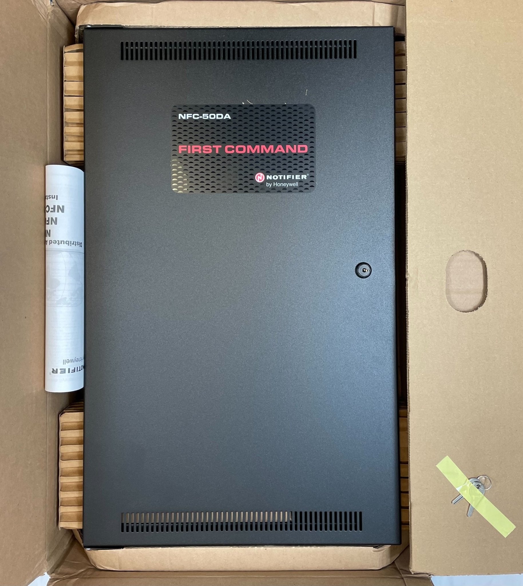 Notifier NFC-50DA amplifier, black rectangular device with connection ports and controls, designed for professional audio applications.
