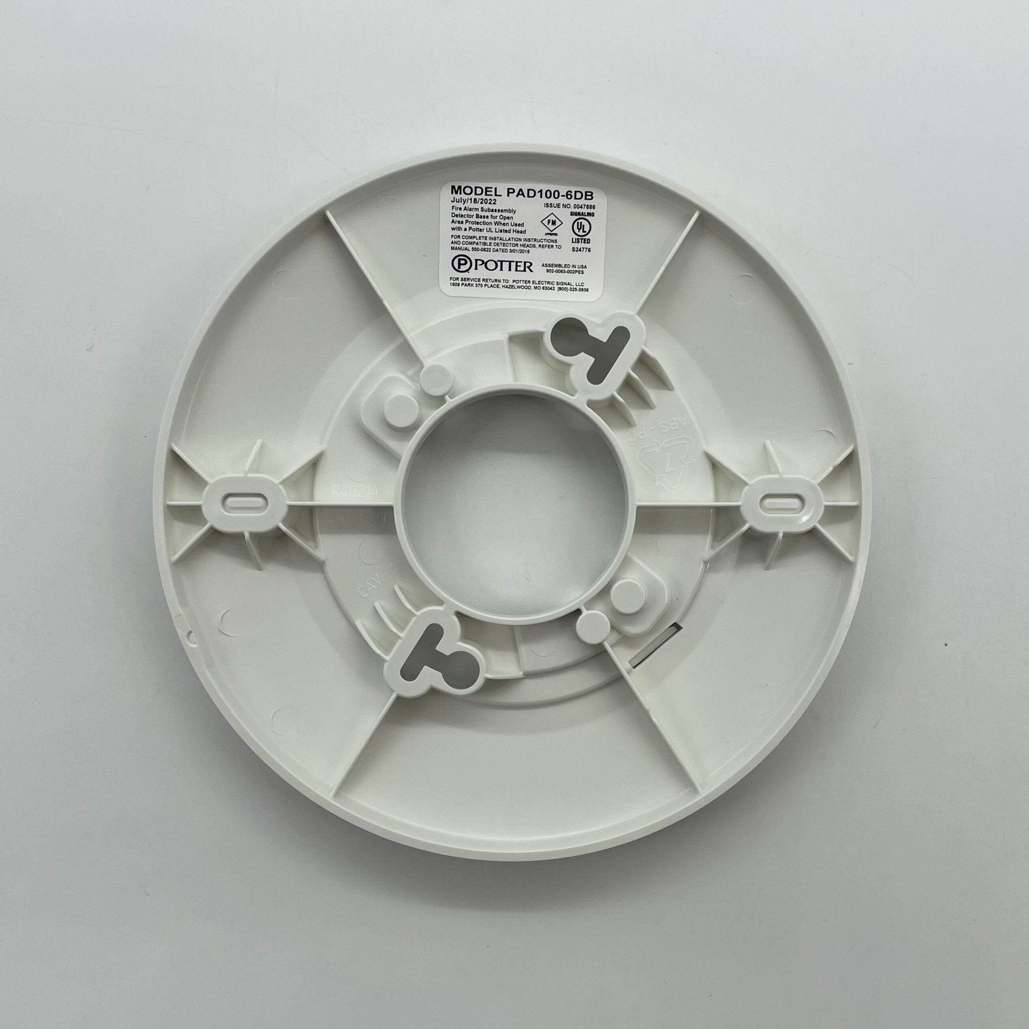 Potter PAD100-6DB 6-inch addressable detector base for fire alarm systems, shown in a clean, white plastic base with wiring terminals.