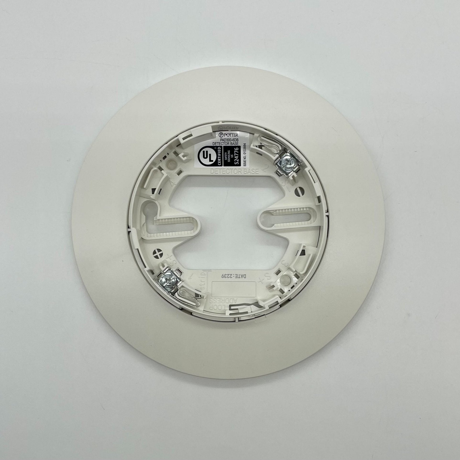 Potter PAD300-6DB 6-inch detector base for alarm systems, black plastic with mounting holes and wiring compartment.
