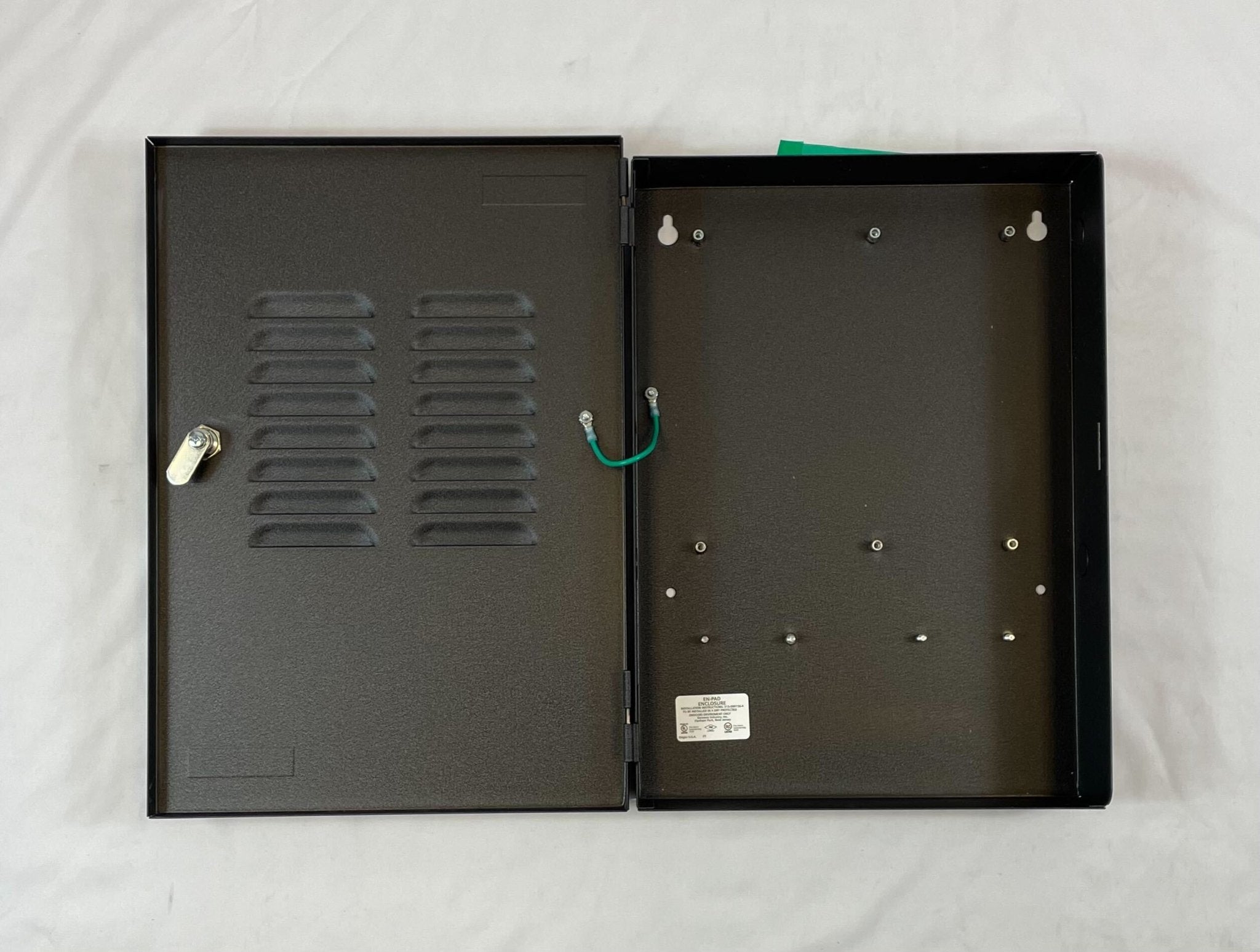 Siemens EN-PAD black enclosure for PAD-3 fire alarm system with secure housing and control interface.