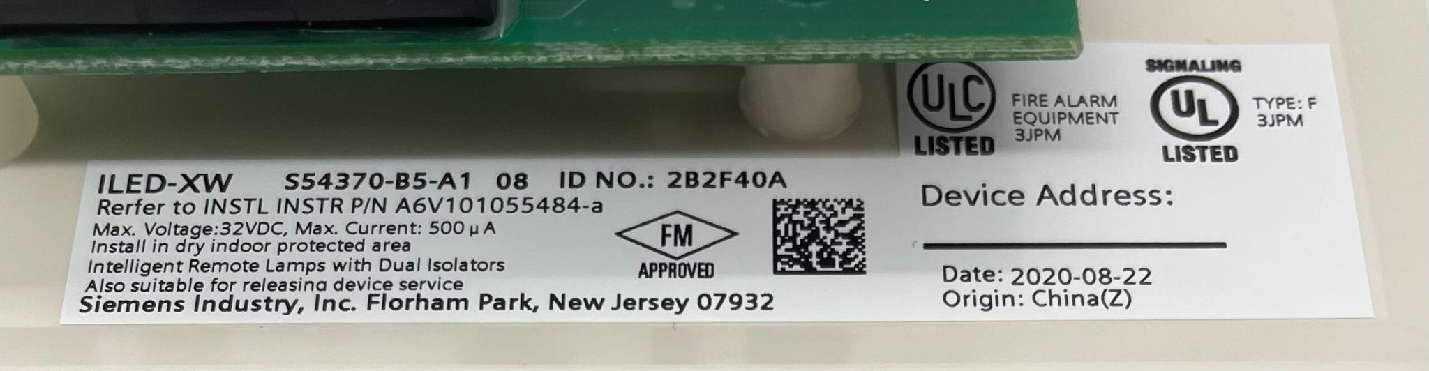 Siemens ILED-XW fire alarm with intelligent lamp, compact device for fire safety, featuring LED indicators and sleek design.