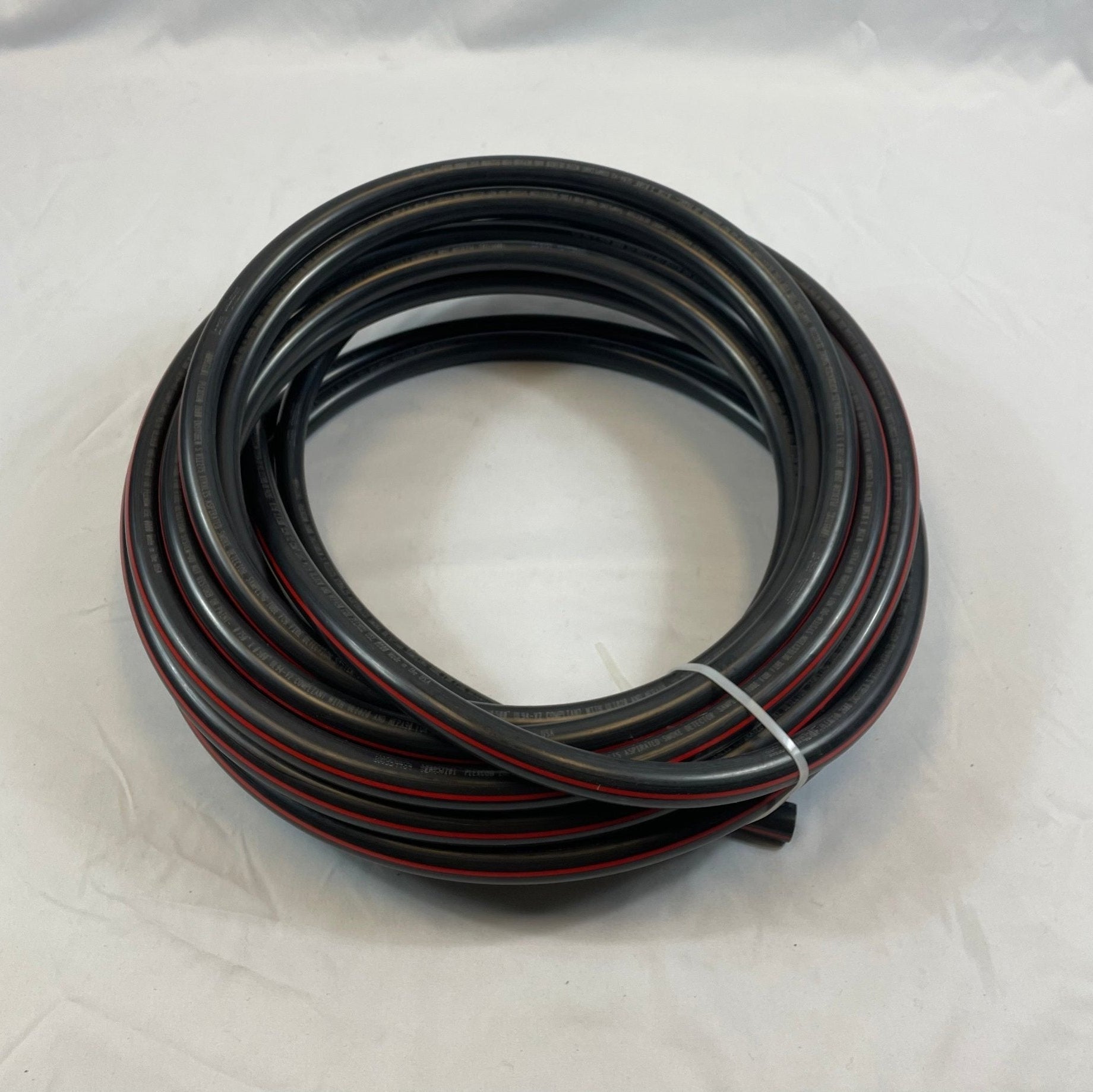 Siemens LF42249 50 ft flexible single-core tubing for fire alarm wiring, shown coiled and ready for installation.