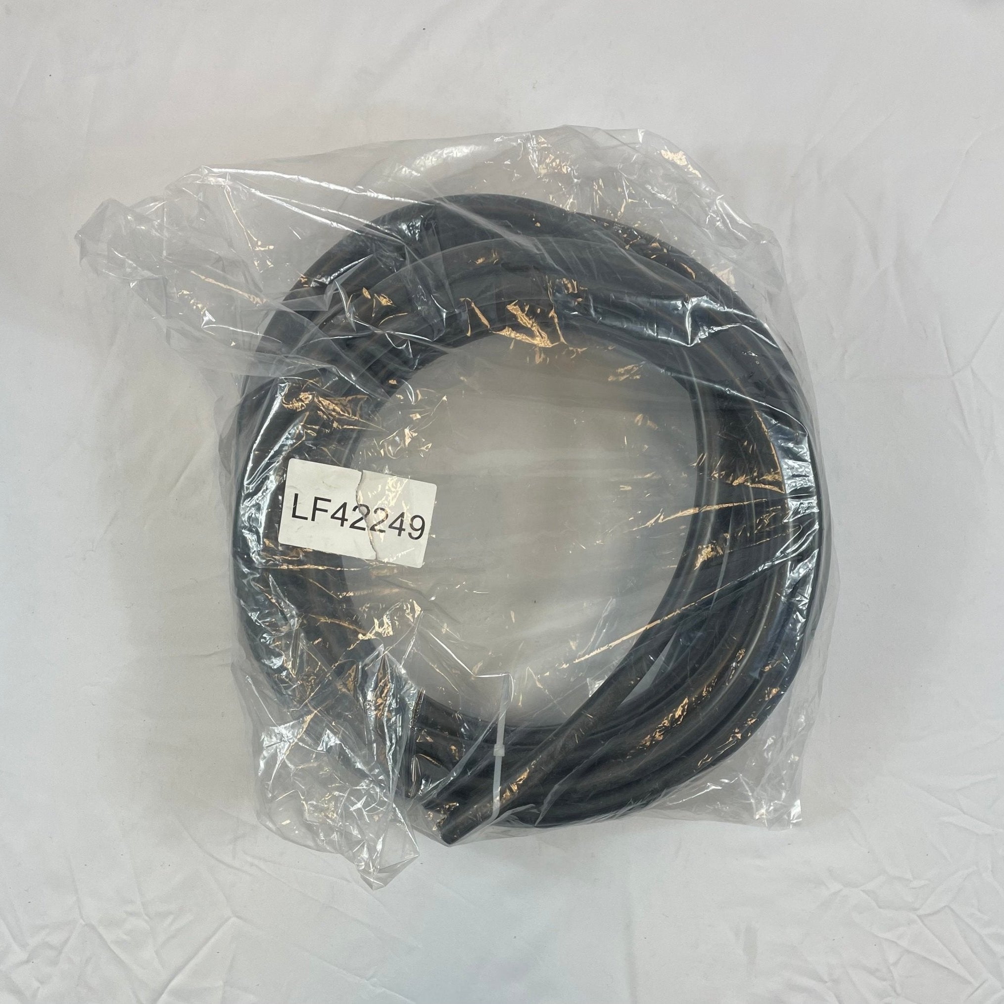 Siemens LF42249 50 ft flexible single-core tubing for fire alarm wiring, shown coiled and ready for installation.