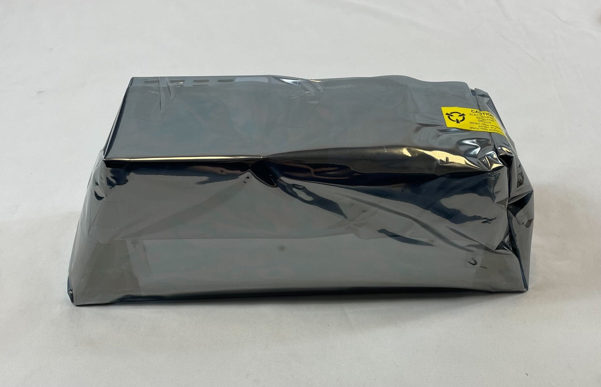 Siemens PSX-12 12A power supply extender for electronic devices, shown with connectors and compact design.