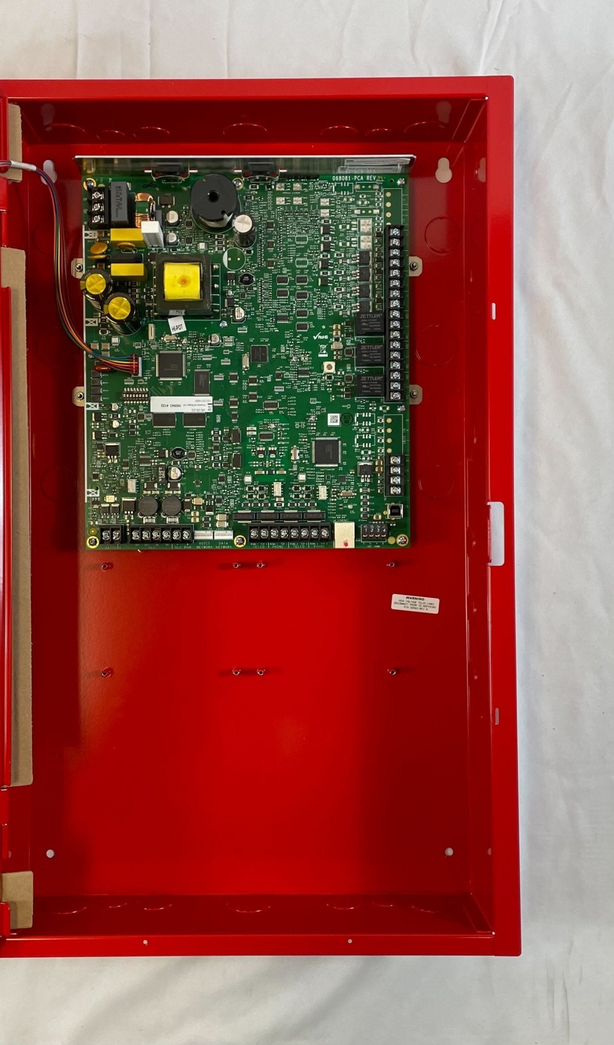 Silent Knight 6808 fire alarm control panel with 198 points, black control panel with display and control buttons.