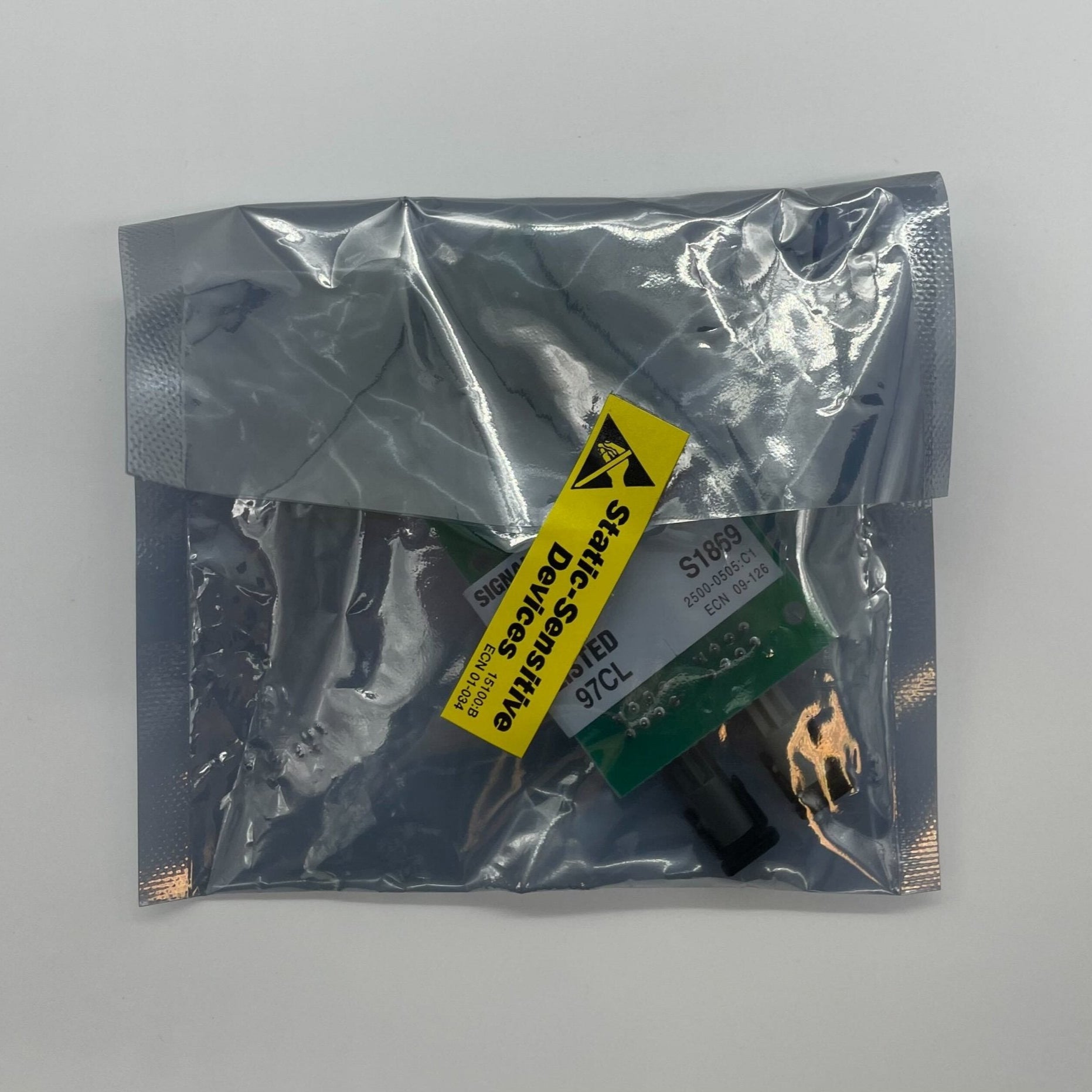 Silent Knight SK-FML plug-in fiber loop module for fire alarm systems, shown installed in a fire alarm panel.