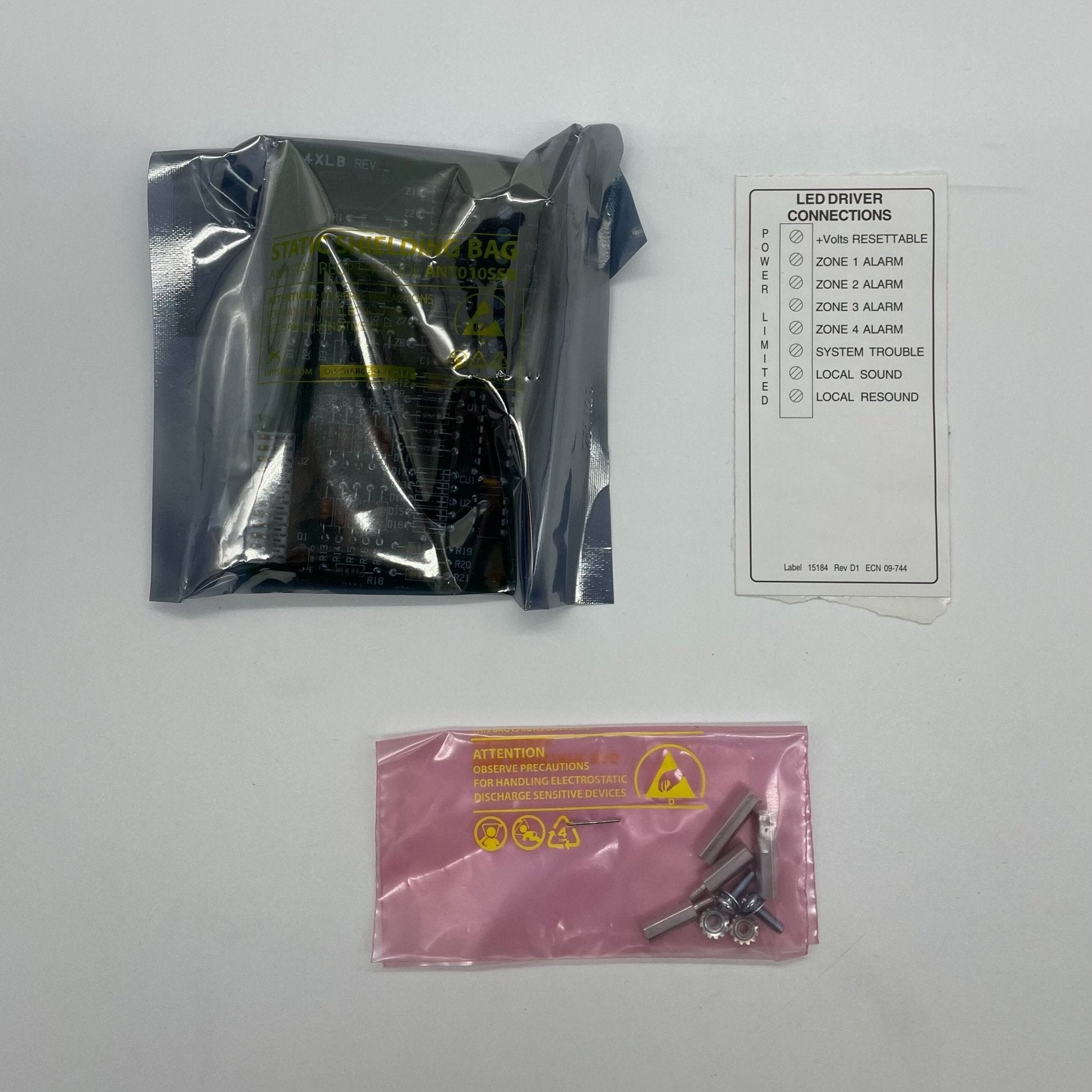 Silent Knight SK-4XLM LED interface module, compact device with multiple connection ports for security system integration.
