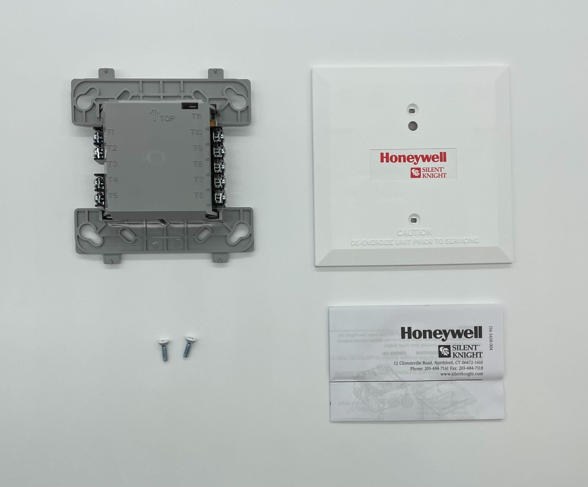 Silent Knight SK-RELAY relay module showing multiple relay switches and connection terminals for security system control.