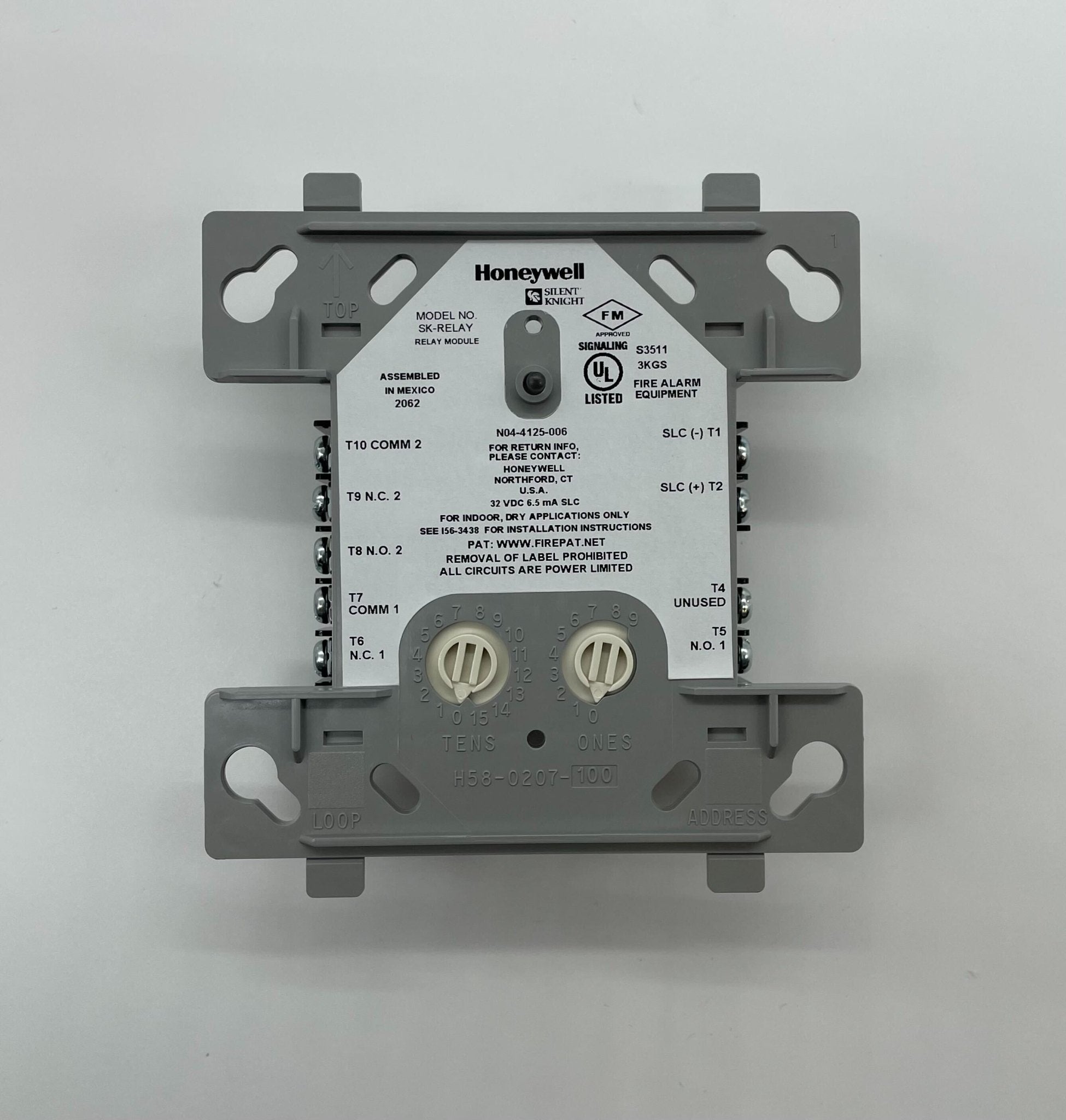Silent Knight SK-RELAY relay module with multiple switches and wiring terminals for security system control.