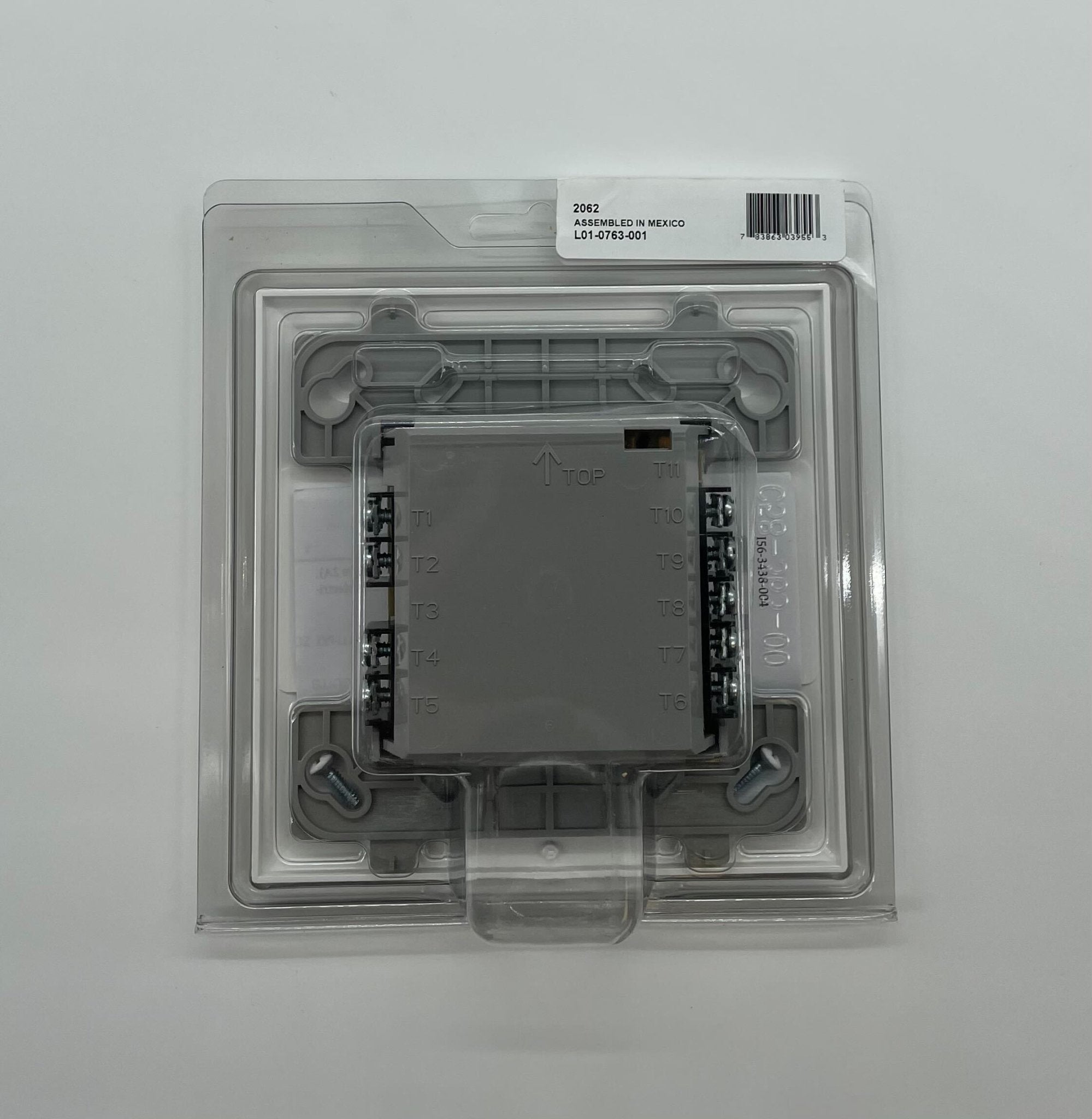 Silent Knight SK-RELAY relay module showing multiple relay switches and connection terminals for fire alarm system control.