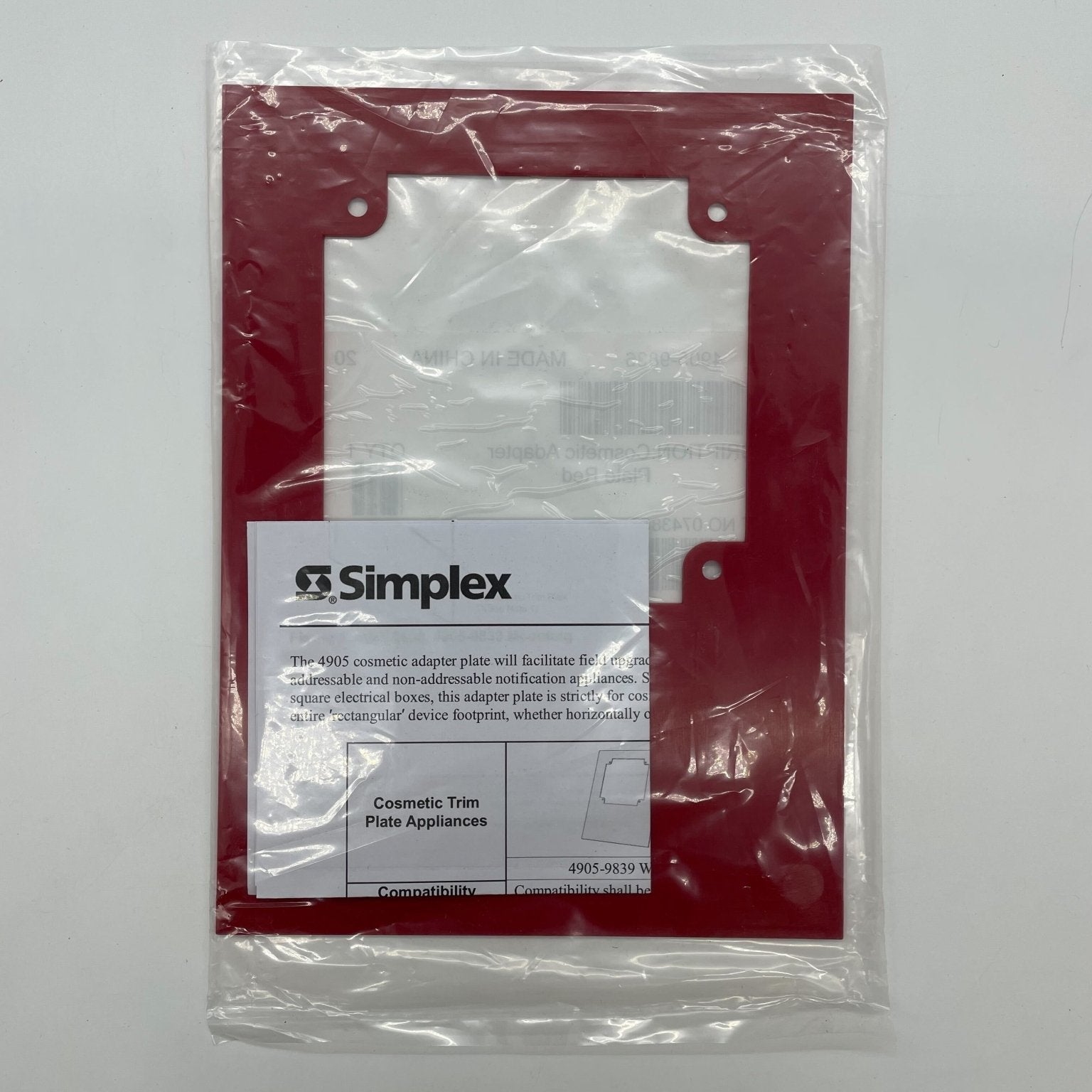 Simplex 4905-9836 cosmetic adapter for electrical wiring, featuring a compact design and easy connection points.