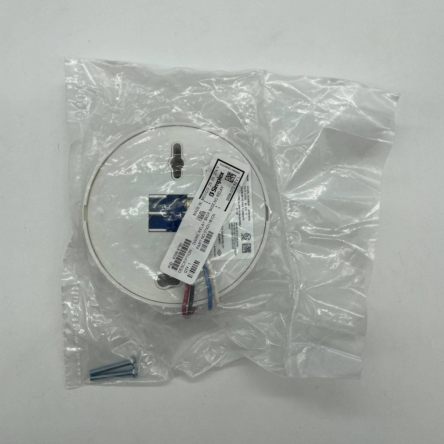 Simplex 4098-9780 2-wire sensor supervised relay base on a plain background, showing its compact design and connection terminals.