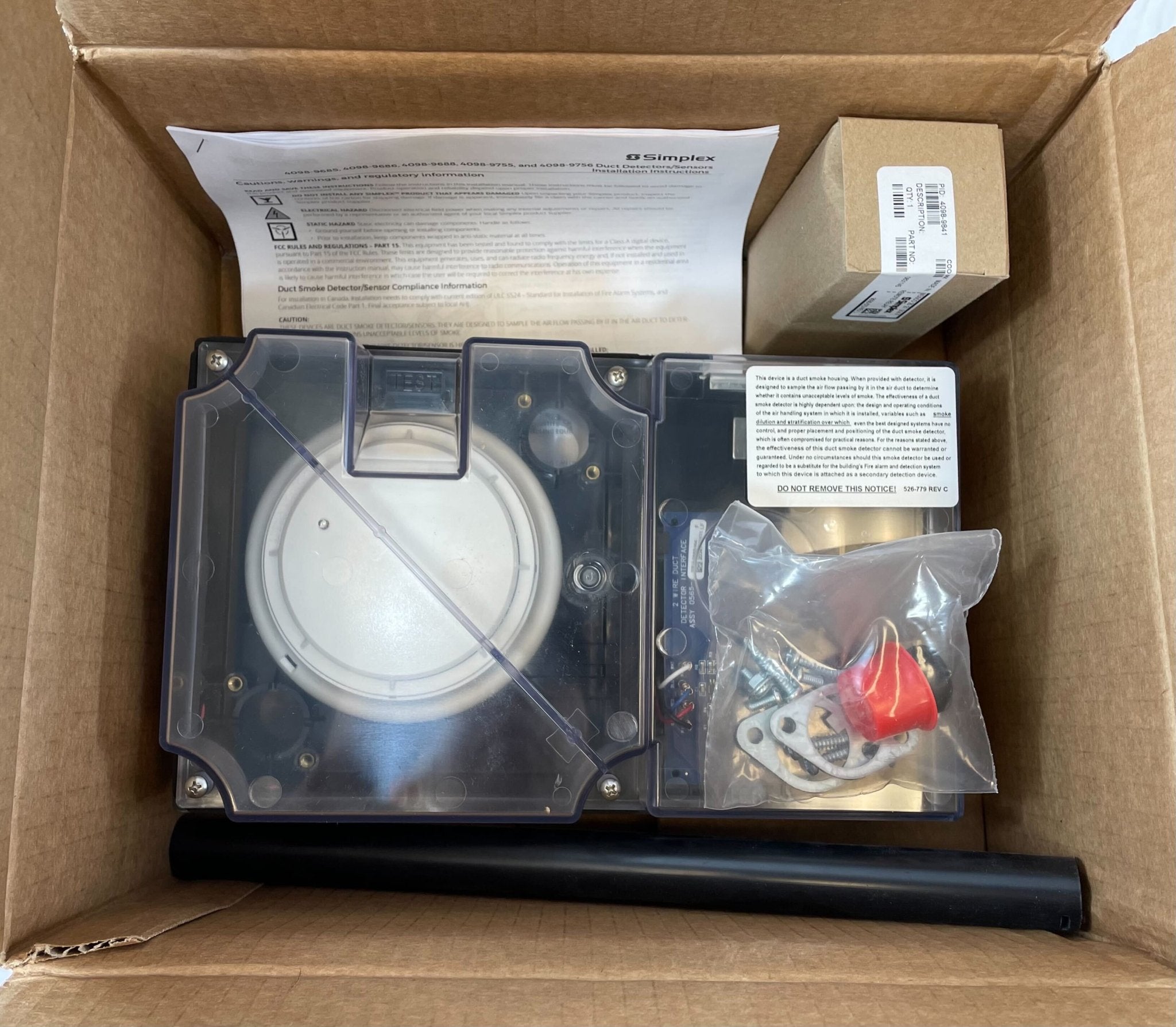 Simplex 4098-9688 duct detector installed in HVAC duct system, part of Simplex duct detectors for airflow monitoring.