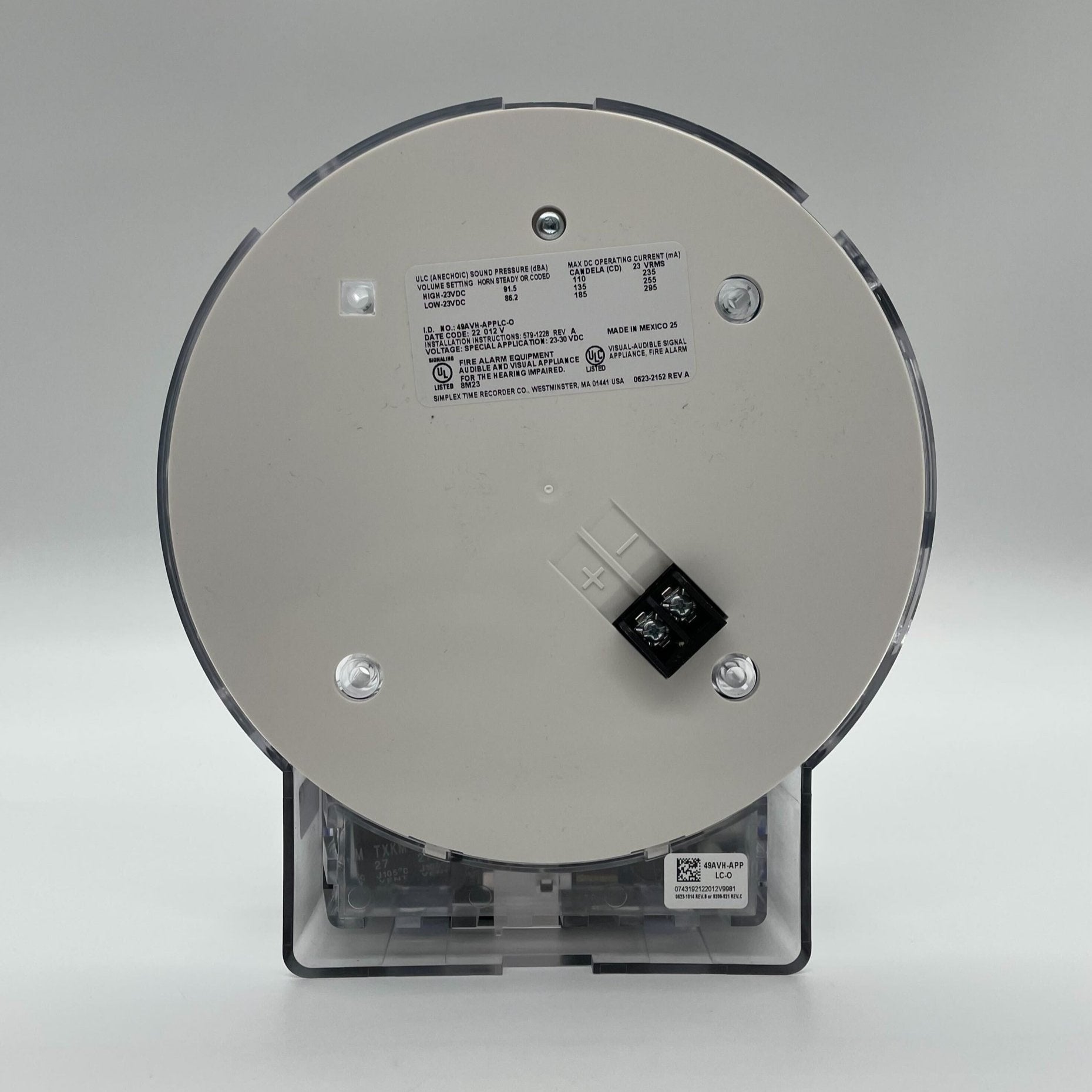 Simplex 49AVH-APPLC-O fire alarm with ceiling mounting for industrial safety in a commercial building.