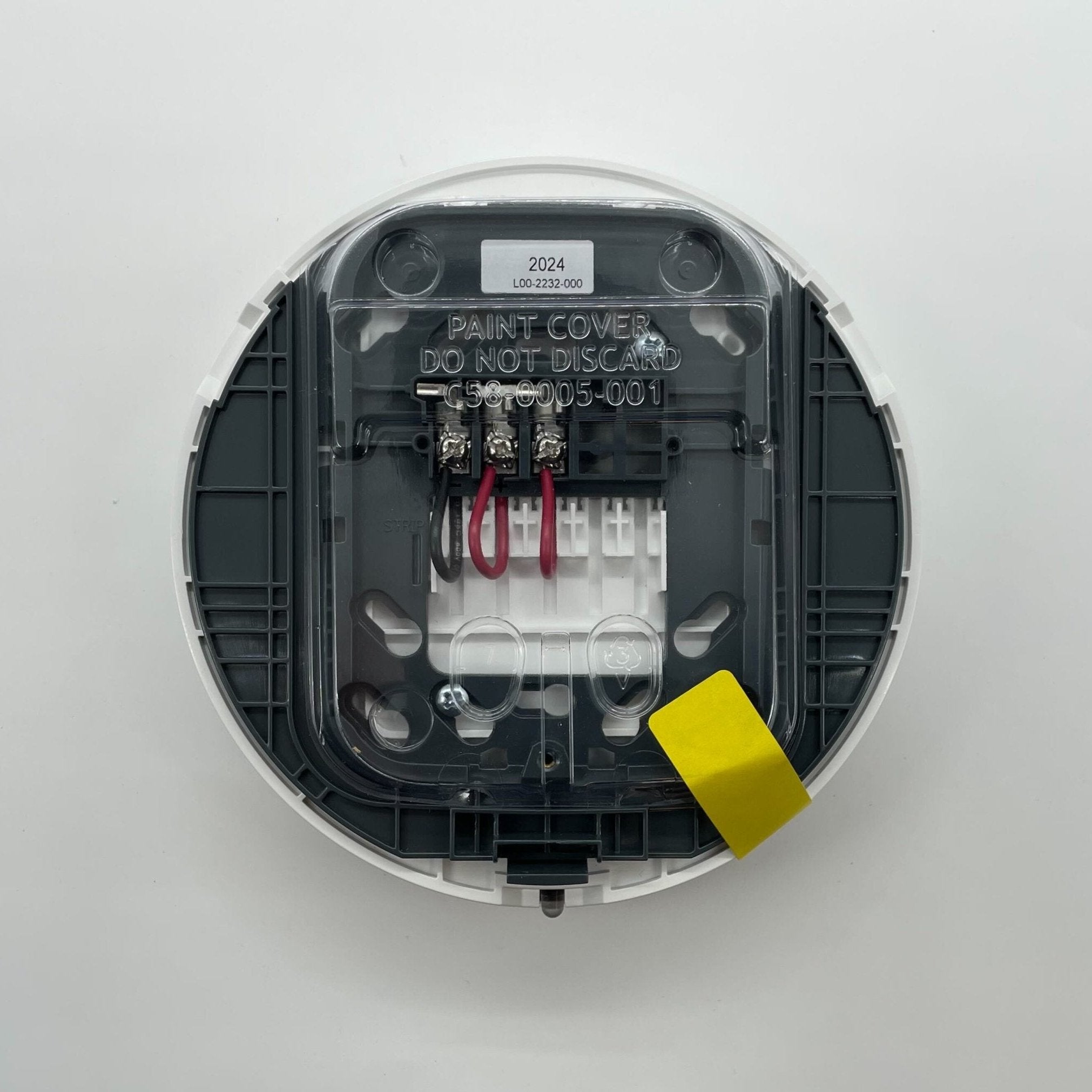 System Sensor WAV-CWL wireless audio-visual base showing the device with mounting brackets and connection ports.