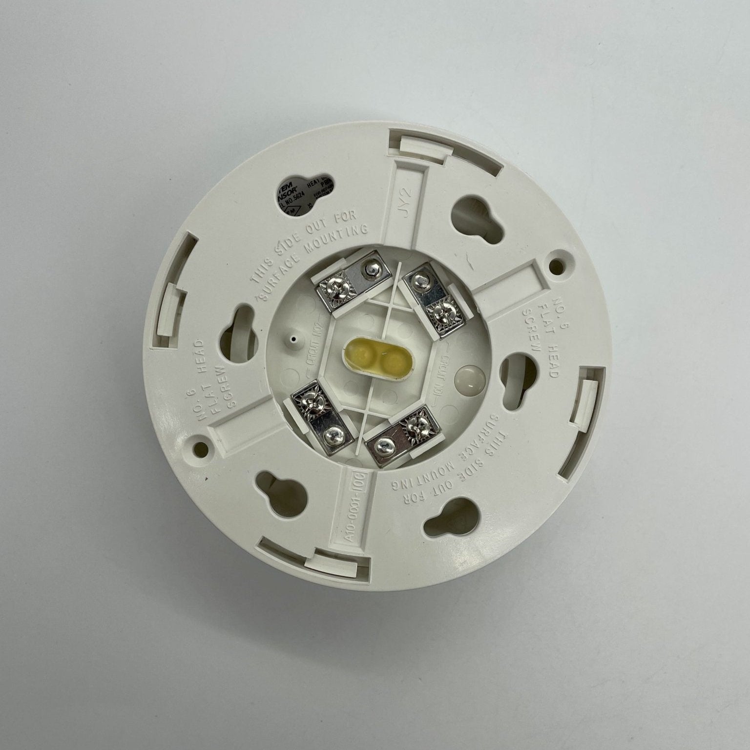System Sensor 5624 heat detector with a round white sensor head, used for temperature-based fire detection in safety systems.