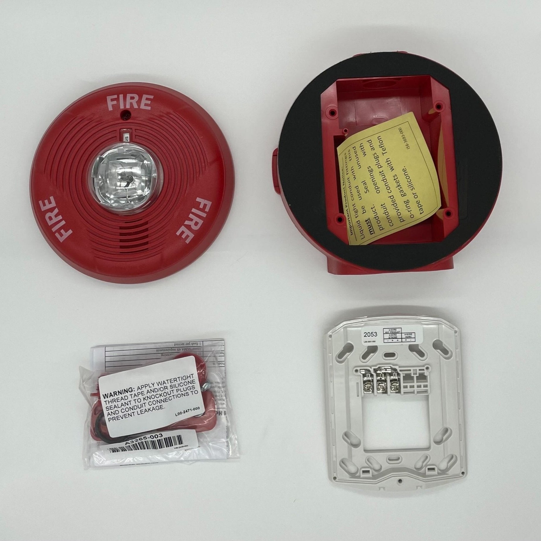 System Sensor PC2RHK outdoor horn strobe with selectable output, visible in a weatherproof housing for fire alarm notification.