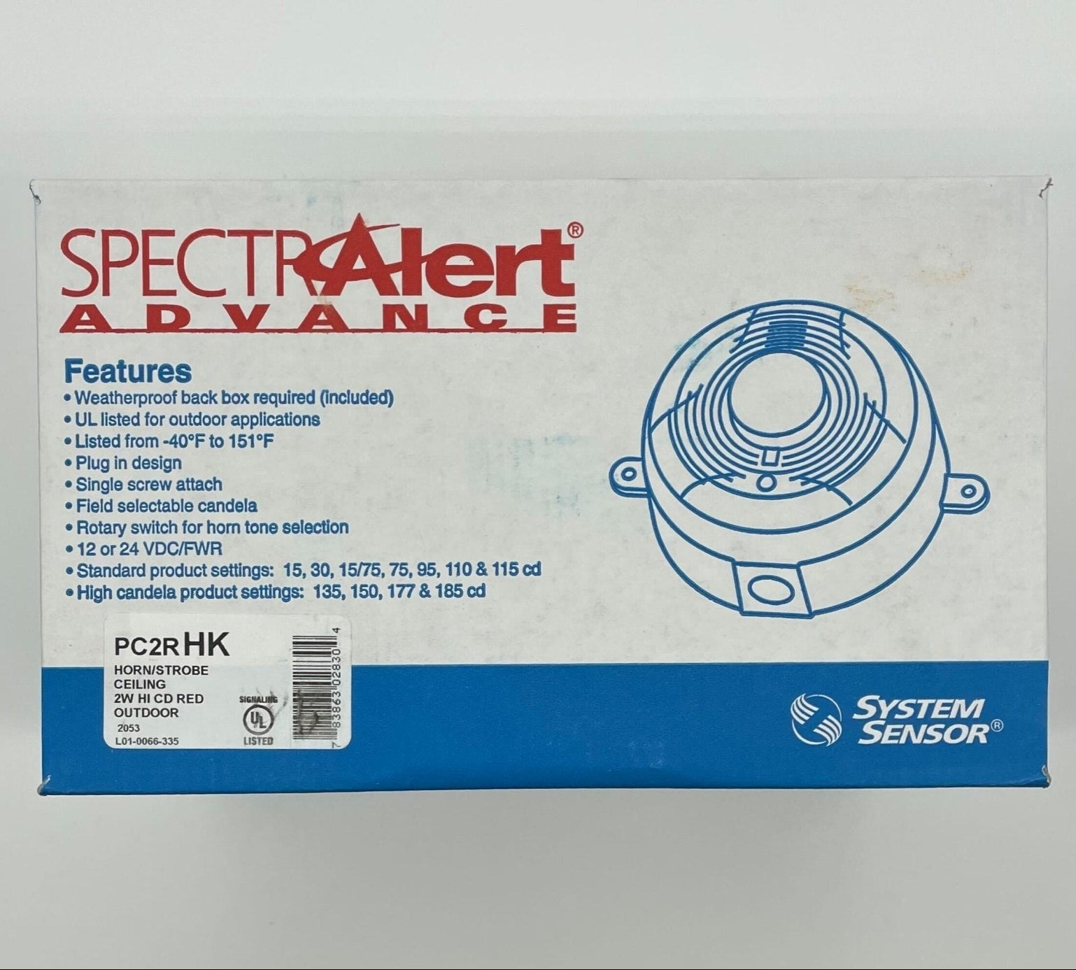 System Sensor PC2RHK outdoor horn strobe with selectable output, mounted outdoors with weather-resistant housing and visible wiring.