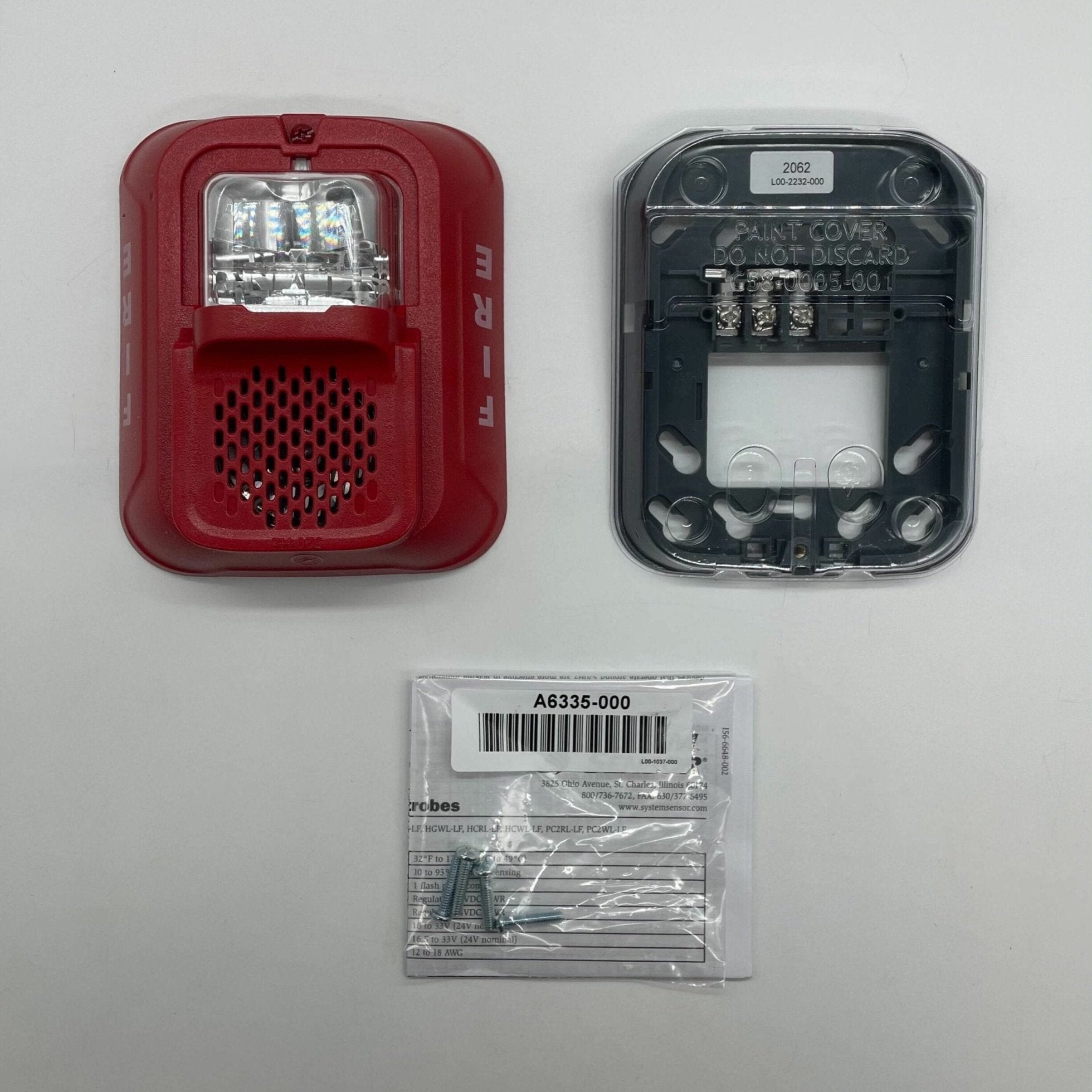 System Sensor P2RL-LF low frequency sounder strobe with flashing light and horn for alarm notification, mounted on a wall.