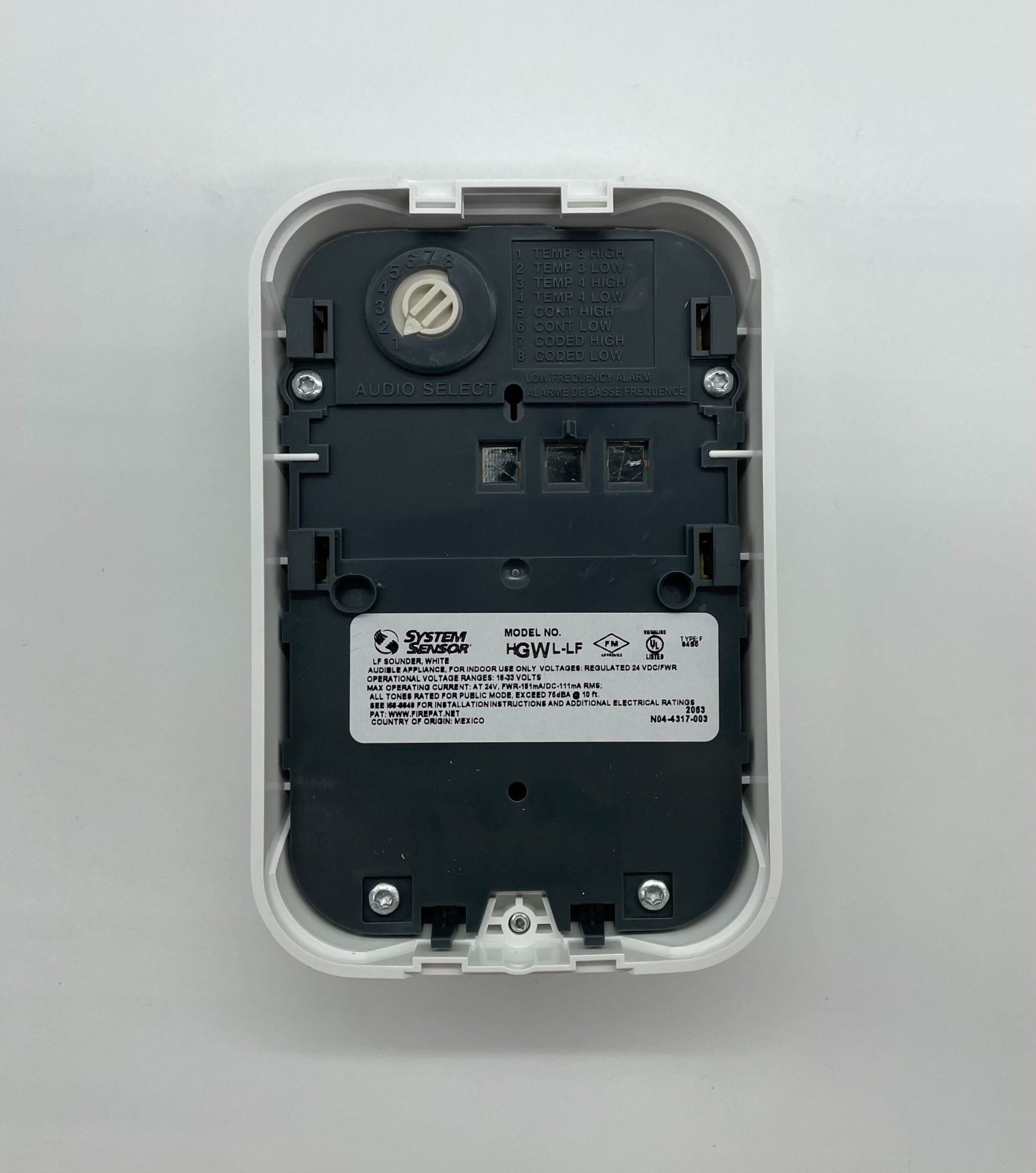 System Sensor HGWL-LF low-frequency compact sounder displaying its cylindrical design and mounting features.