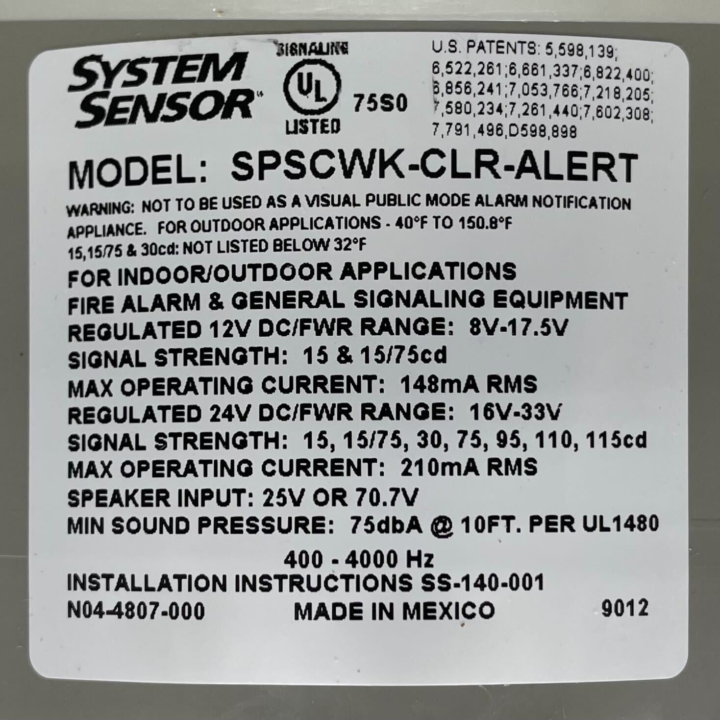 System Sensor SPSCWK-CLR-ALERT ceiling speaker strobe showing a clear alert lens and mounting hardware for fire alarm notification.