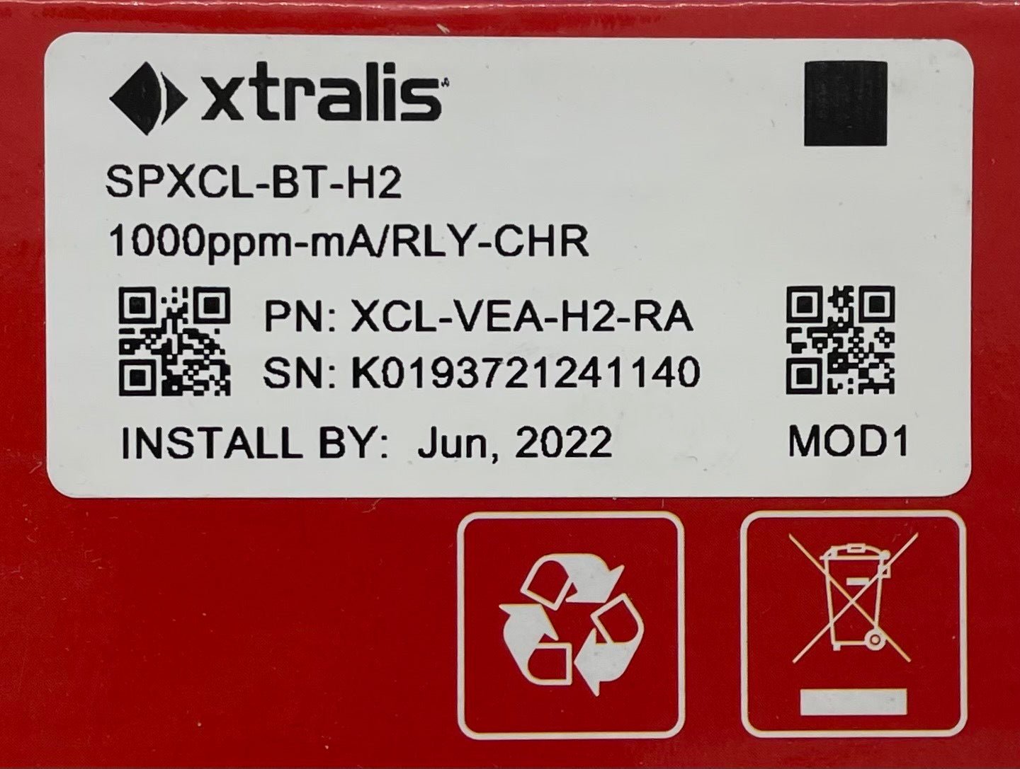 Vesda by Xtralis Sensepoint XCL H2 gas detector measuring 1000ppm, mounted on wall in industrial setting.