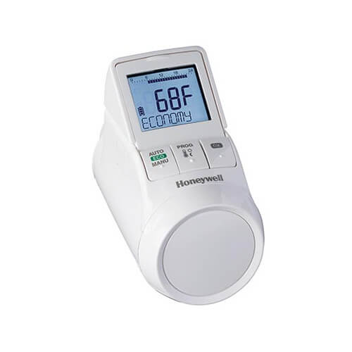 Honeywell Home HR90 TheraPro electronic radiator controller mounted on a wall with digital display and control buttons.