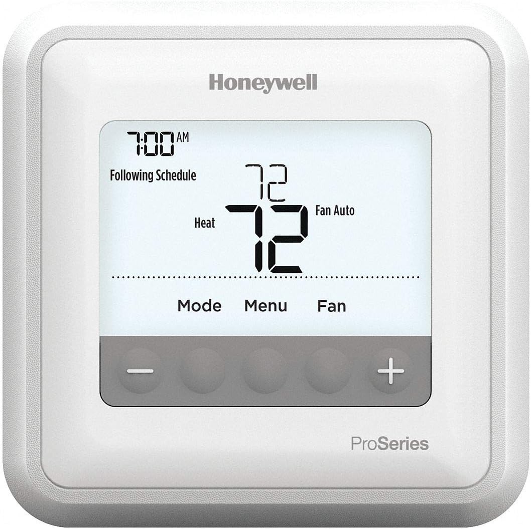Honeywell Home T4 Pro Programmable Thermostat mounted on wall, digital display with temperature controls and settings.