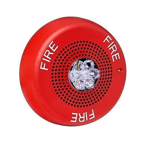 Eaton Wheelock Eluxa Horn Strobe fire alarm with FIRE lettering, ceiling mount, featuring horn and strobe light for emergency alerts.