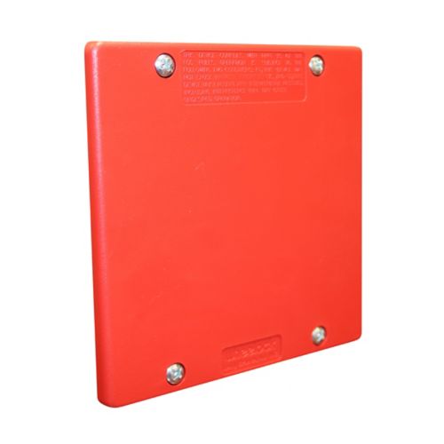 Eaton Wheelock DSM-12/24-R sync module for fire alarms mounted on wall, red color, used in fire alarm systems.