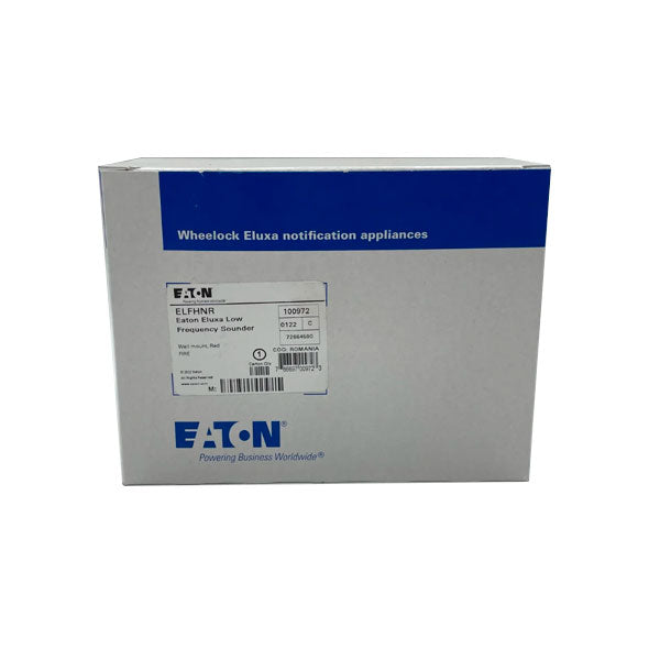 Eaton Wheelock ELFHNR Eluxa low frequency sounder mounted on a panel with wiring and control components.