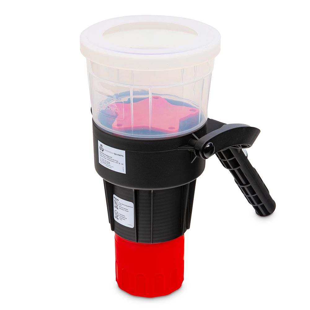 Solo 330 aerosol smoke and CO dispenser used in fire alarms, shown in a compact, white device with safety vents and control buttons.